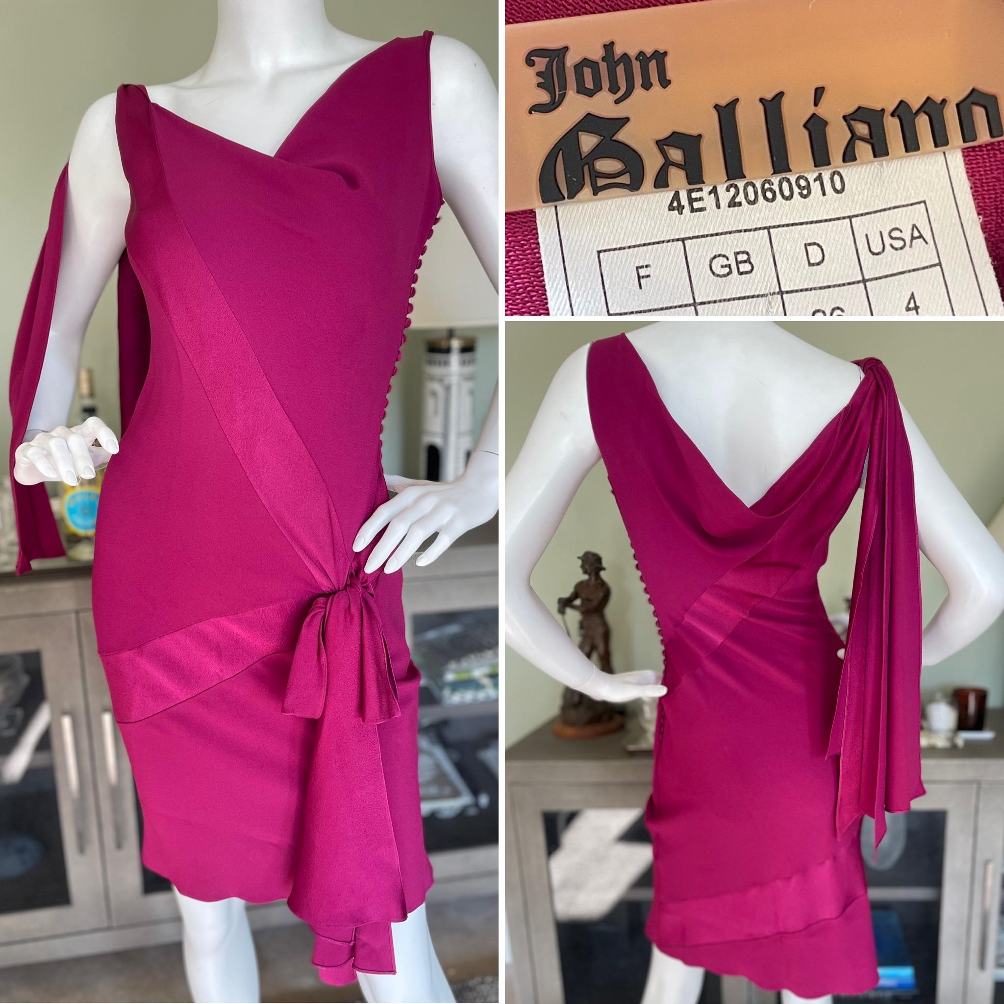  John Galliano 2004 Raspberry Bias Cut Cocktail Dress.
Utilizing both the front and back of the fabric to create a matte / shiny pattern, a technique Galliano uses to great effect throughout his career.
So pretty, please use the zoom feature to see