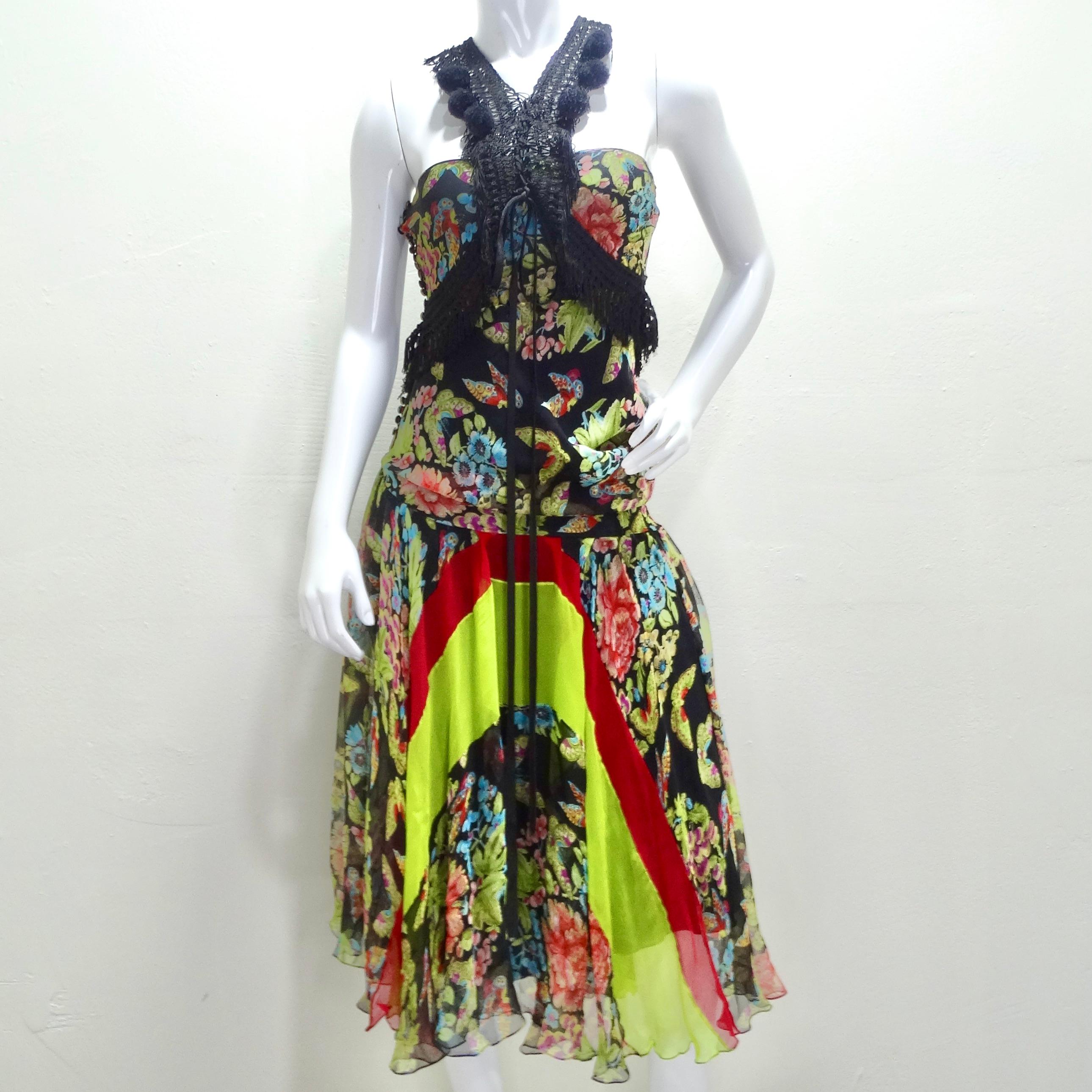 Do not miss out on the John Galliano F/W 2002 Esquimeau Printed Silk Bias Cut Dress – a masterpiece of vibrant artistry and iconic design. This dress isn't just a garment; it's a wearable piece of art that captures the essence of John Galliano's