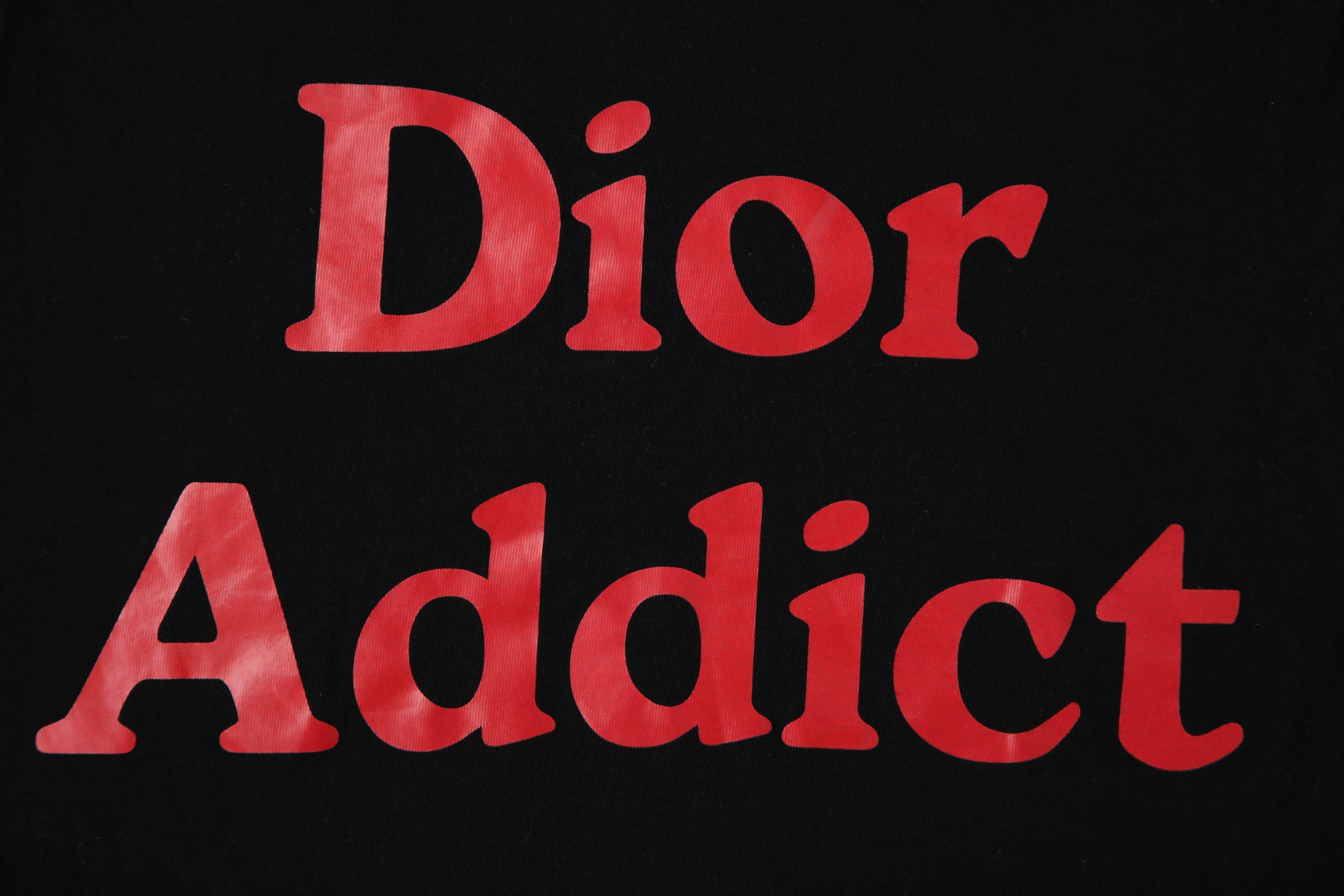 John Galliano for Christian Dior tank top with iconic Dior Addict logo in red.

French size 42
