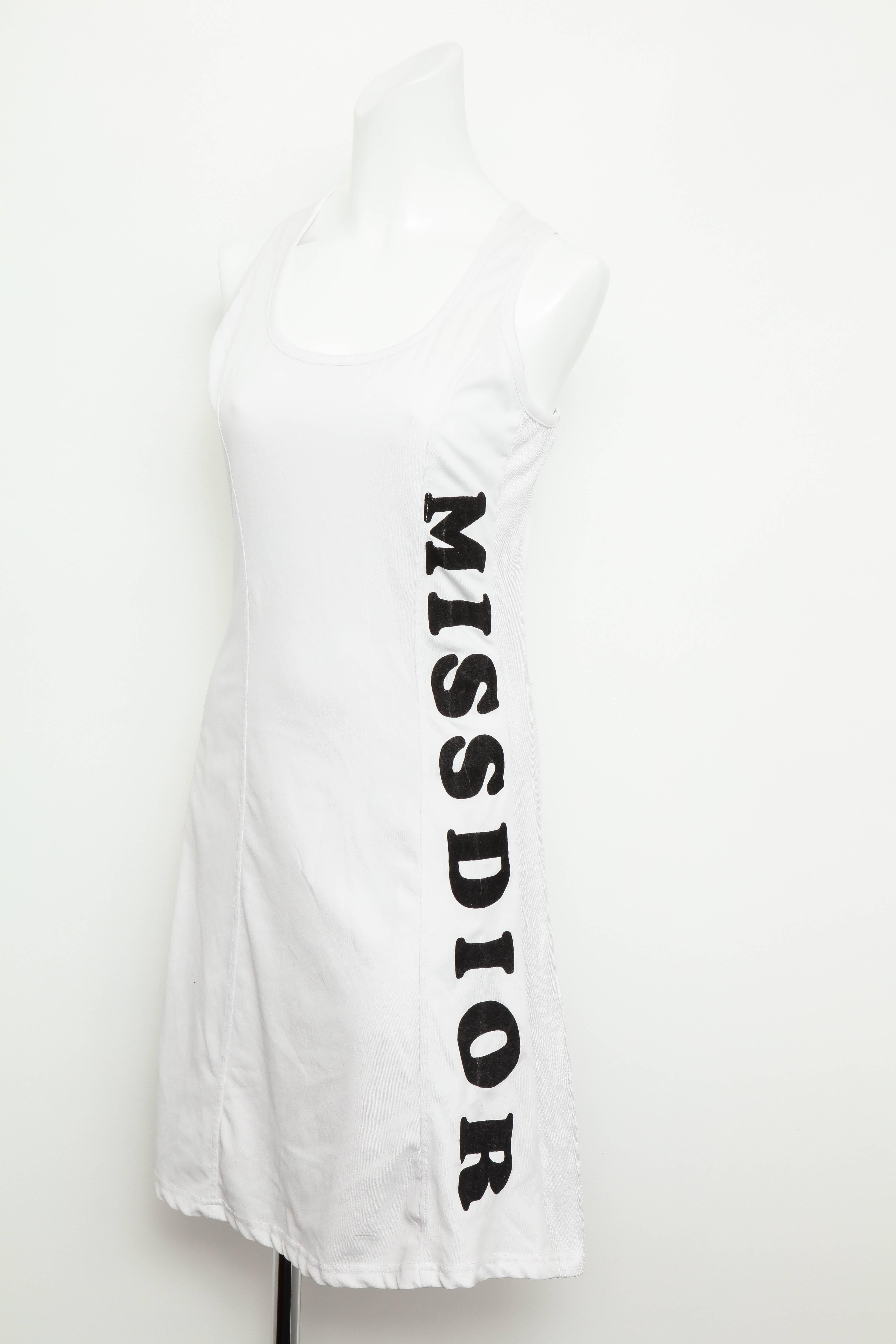 Very rare Christian Dior white dress by John Galliano with Miss Dior logo in black. 

Size FR 38.