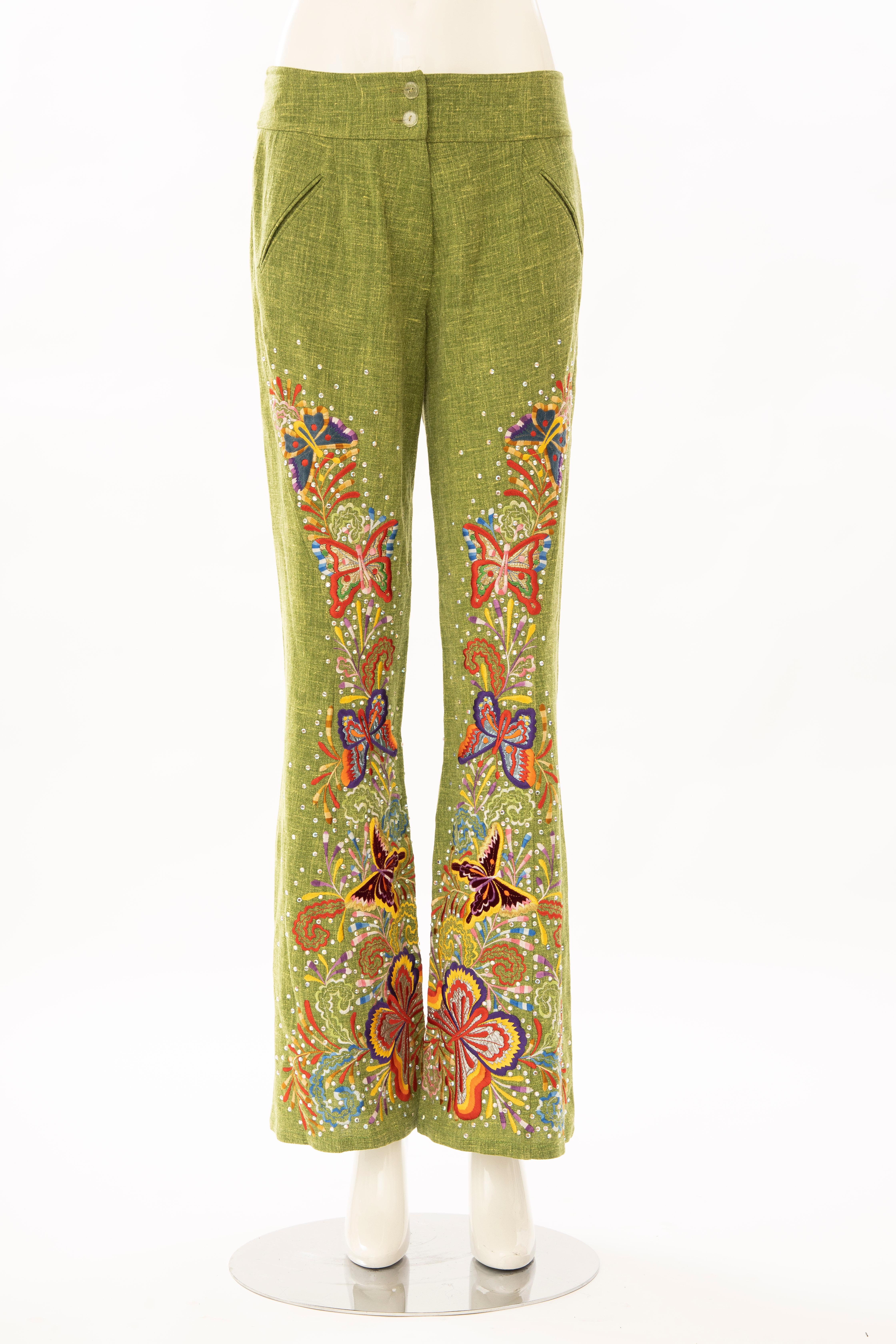 John Galliano for Christian Dior Runway Spring 2002 embroidered flared linen pants with diamante details throughout, dual front welt pockets and concealed front zip closure.

According to Willy Lima, the director of couture development for Christian