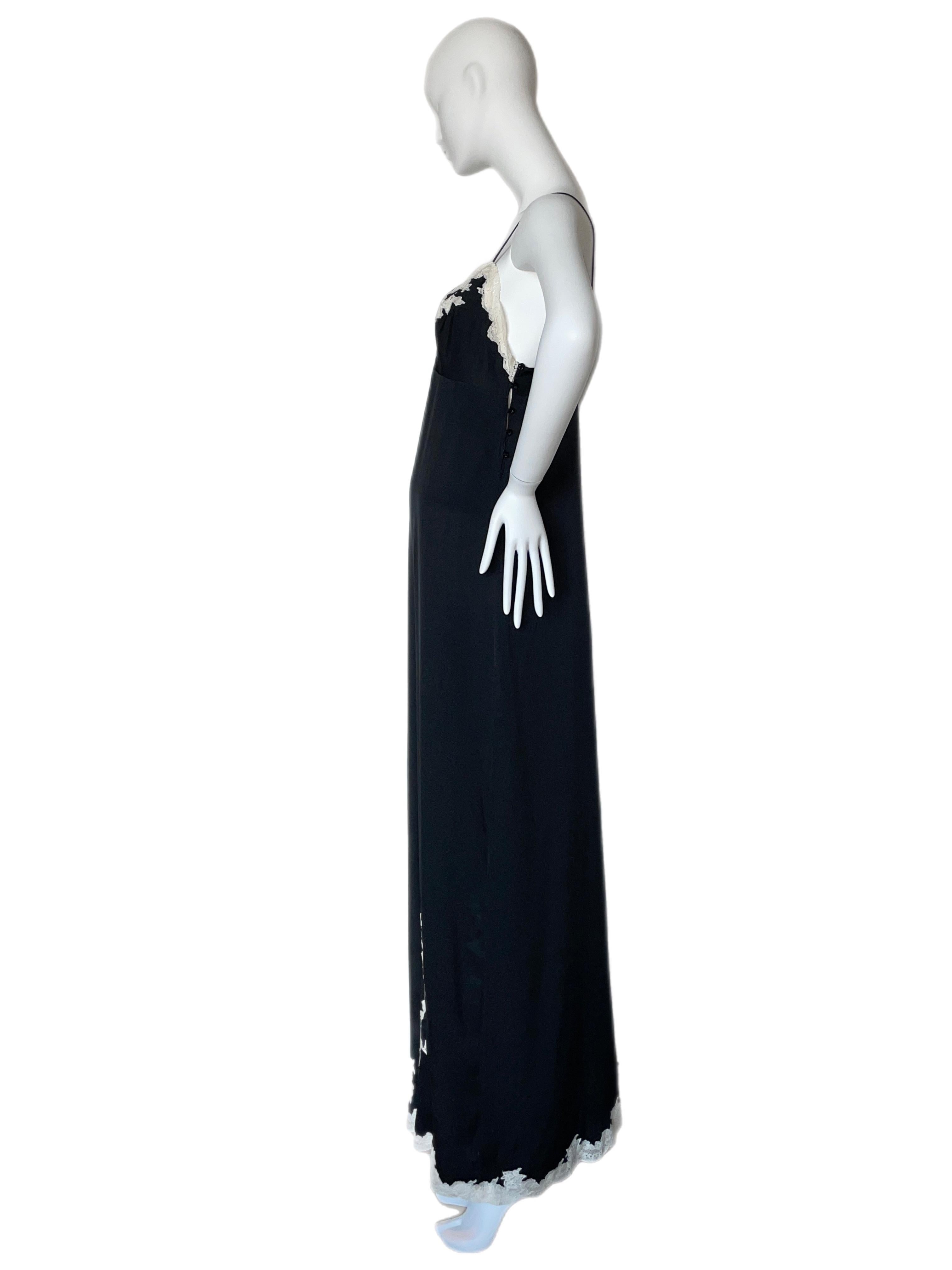 FINAL SALE. NO RETURNS/REFUNDS

John Galliano for Christian Dior. Not sure of the exact year. Pristine condition. Everything is perfect, no yellowing of the white/ivory lace. Anything that looks not uniform is because of the lighting. Could also be
