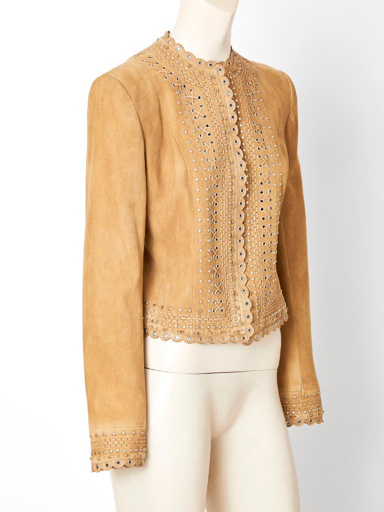 Camel tone, suede, fitted jacket designed by John Galliano for the house of Dior. 
Jacket is collarless with small scallop edging at the neckline, center front, hem and sleeves. Center front hidden zipper closure. Fine grommets decorate the center