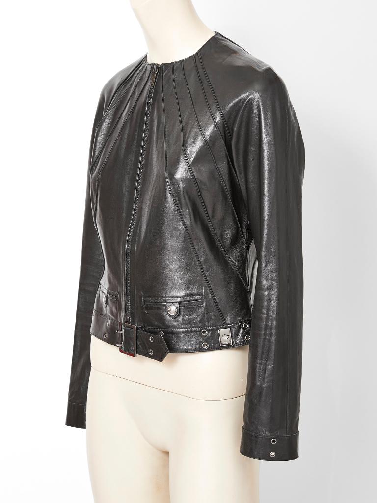 John Galliano for Dior, black, very supple leather, fitted jacket with center front zipper closure, stitched pin tucking detail in the front and back. Buckle closure at the hip, center front with grommets embellishing the hem.
