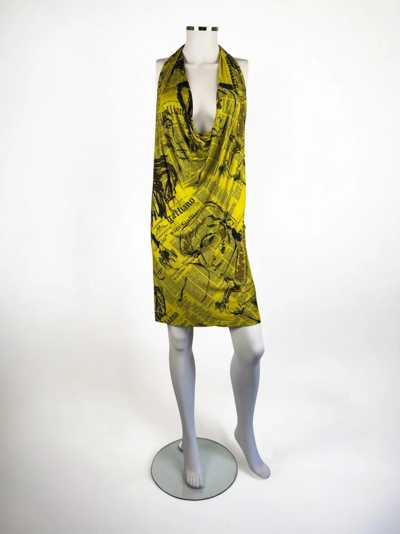 John Galliano newspaper / gazette print jersey mini dress, 2010
Racerback 
Very good condition with no flaws to note
Size: IT 40

