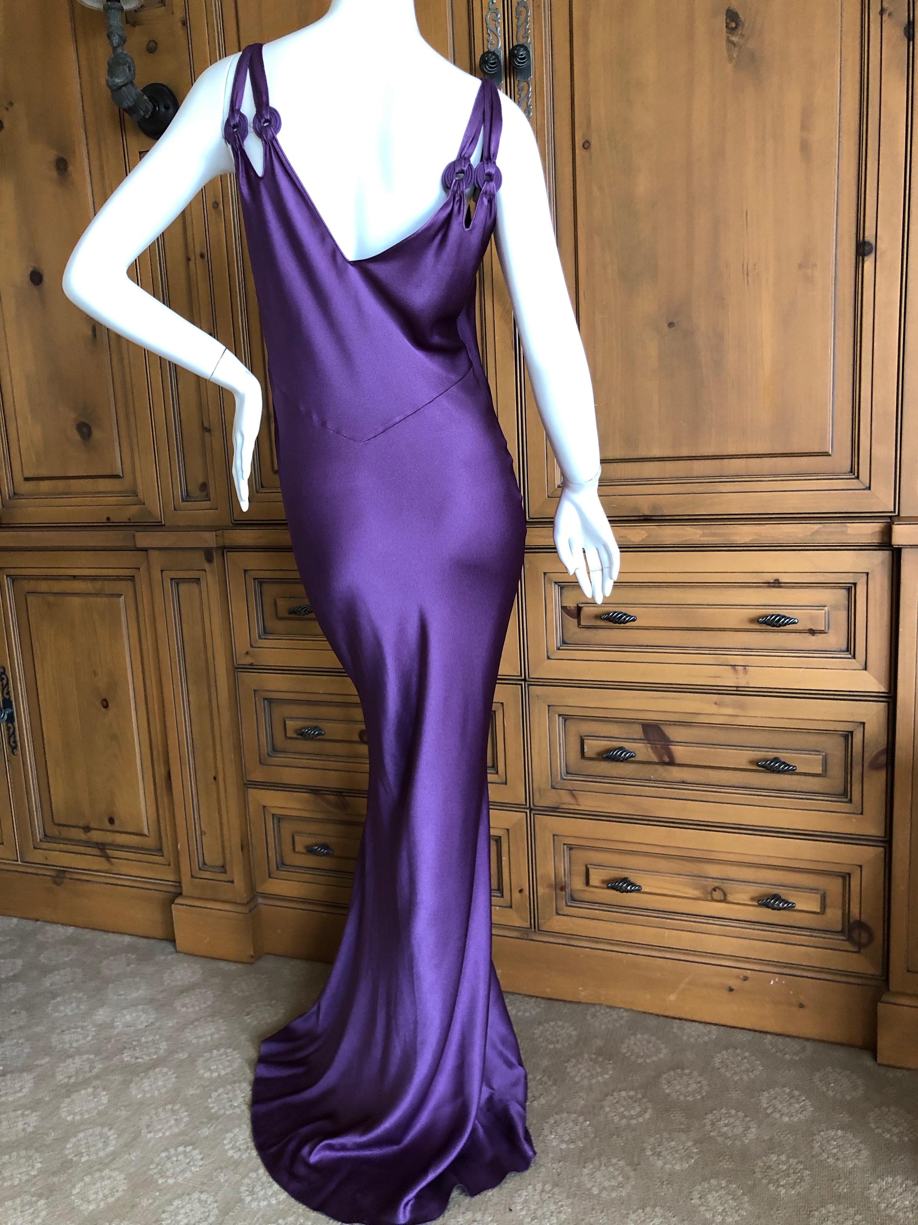 John Galliano Late 90's Luscious Rich Purple Bias Cut Evening Dress .
Cut on the bias, this has a lot of stretch, and will hug your curves in all the right places
Size 42
Bust 40