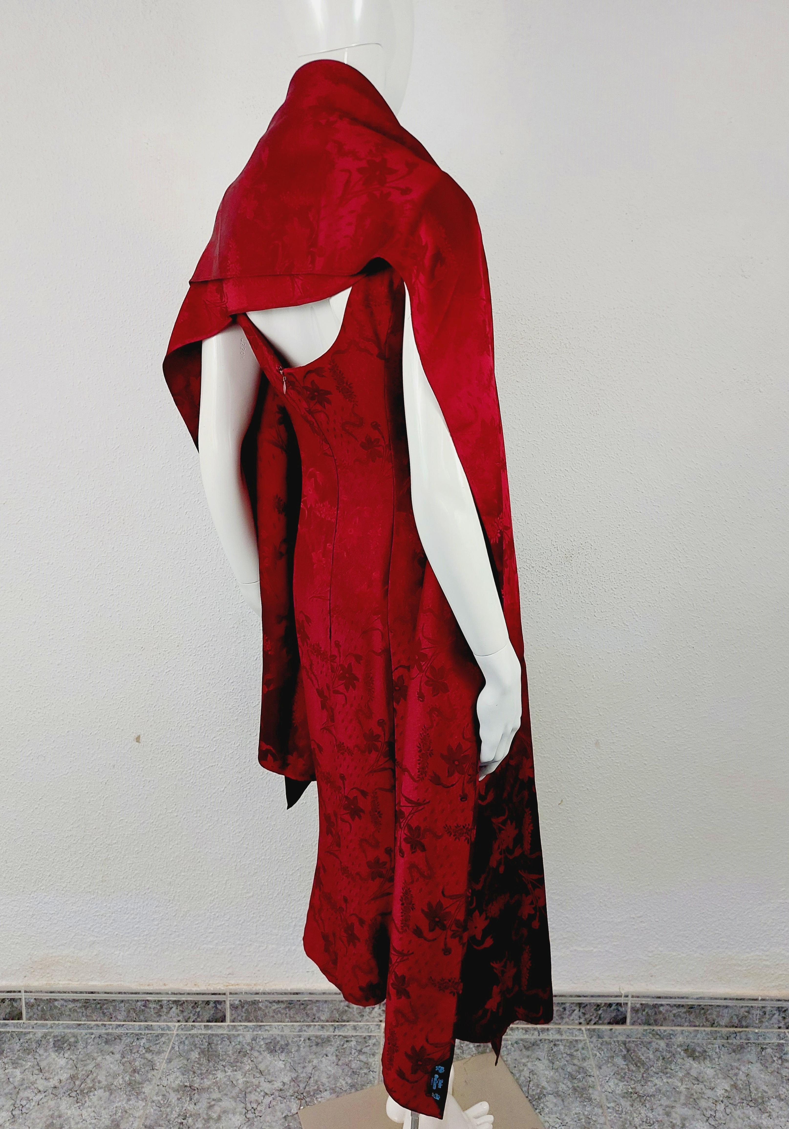 John Galliano London Red Silk Brocade Floral Runway Evening Gown Bias Dress with Scarf Stola, SS 1998

John Galliano red  silk brocade evening dress/ gown with attached fringed scarf and low back Spring-Summer 1998.
Collector piece.
Excellent
