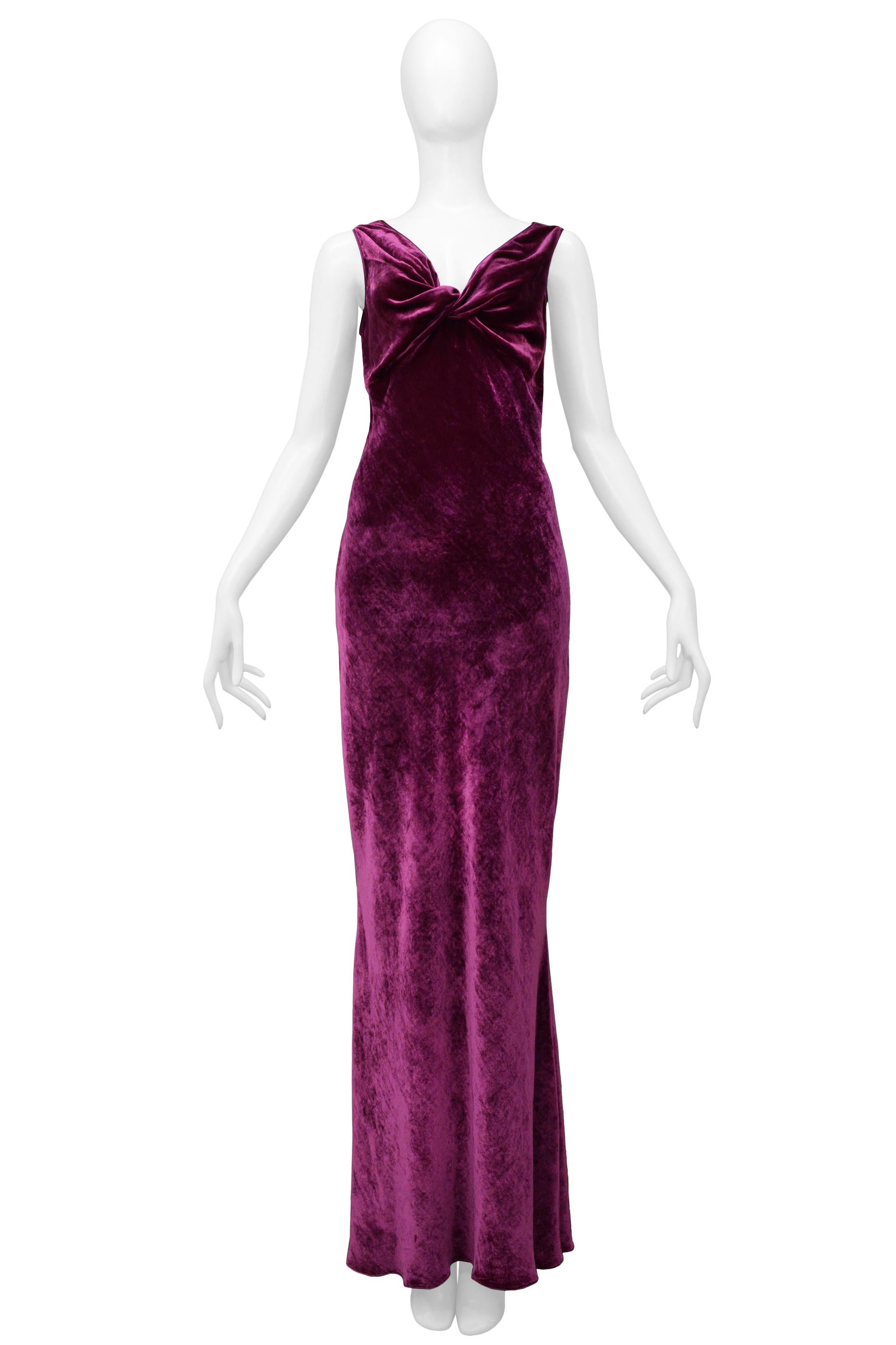 Resurrection is excited to offer a vintage John Galliano magenta velvet gown featuring a plunging front and back neckline, knot detail at bust, and wide straps. 

John Galliano
44
82% Viscose/ 18%Silk
2006 Runway Collection 
Very Good Vintage