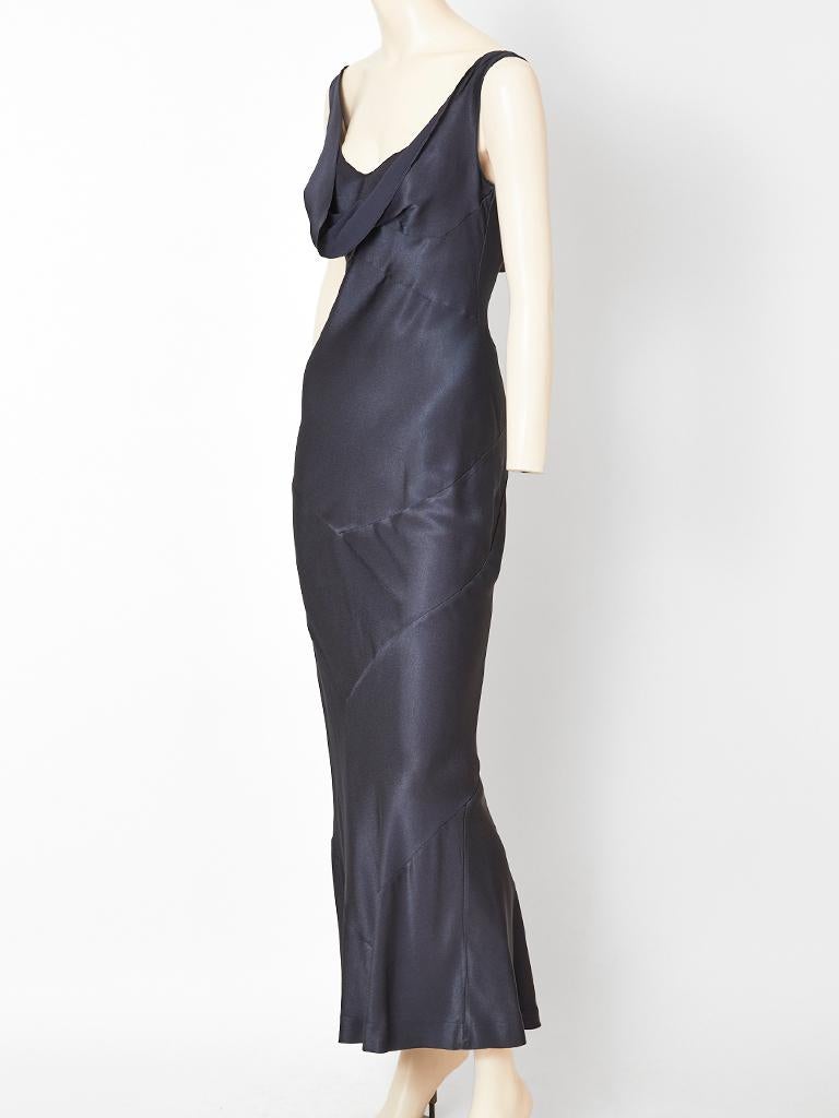 John Galliano, satin back crepe, bias cut evening dress in a midnight blue. Neck is open with some cowling, front and back. There is 