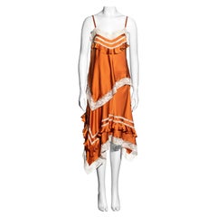 John Galliano orange silk and lace top and skirt set, ss 2006