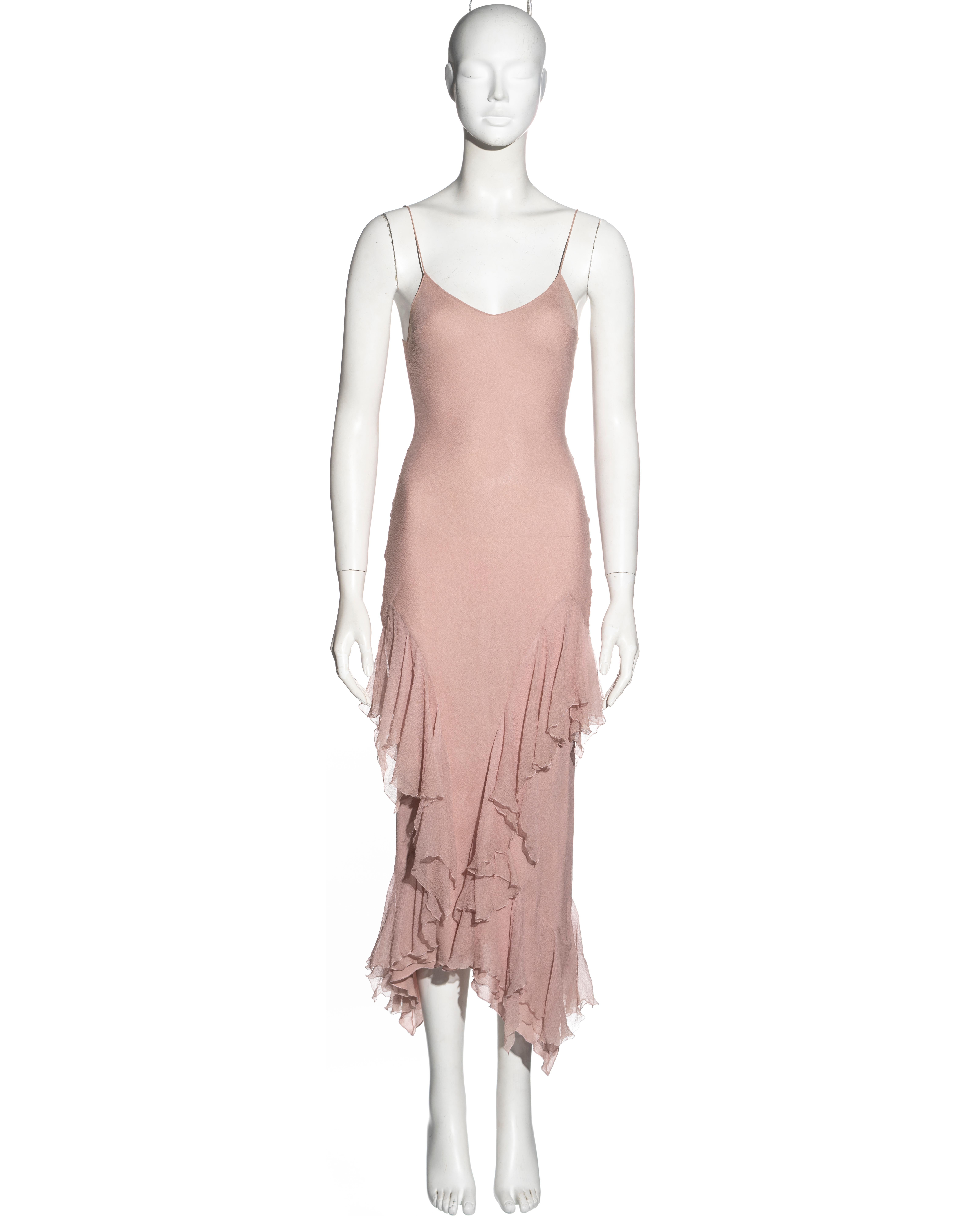 ▪ John Galliano evening dress
▪ Constructed from bias-cut pale pink silk chiffon 
▪ Asymmetric ruffled skirt
▪ V-neck
▪ Spaghetti straps 
▪ FR 38 - UK 10 - US 6
▪ Fall-Winter 1997
▪ 100% Silk
▪ Made in France

All photographs in this listing