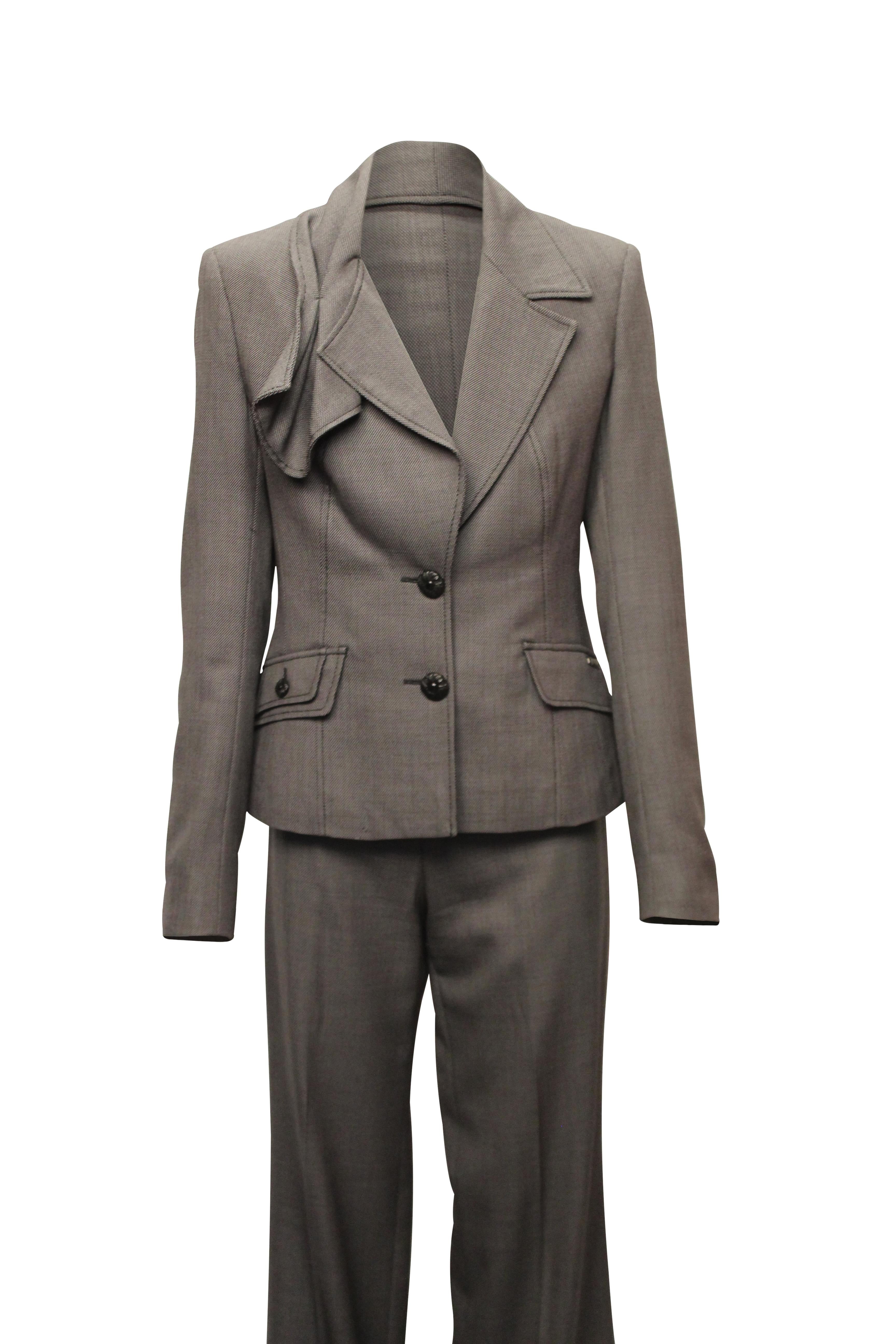 Incredible John Galliano womens pant suit. This powerful two piece in lightweight yet durable wool blend with polyester lining. 
Size 28/42