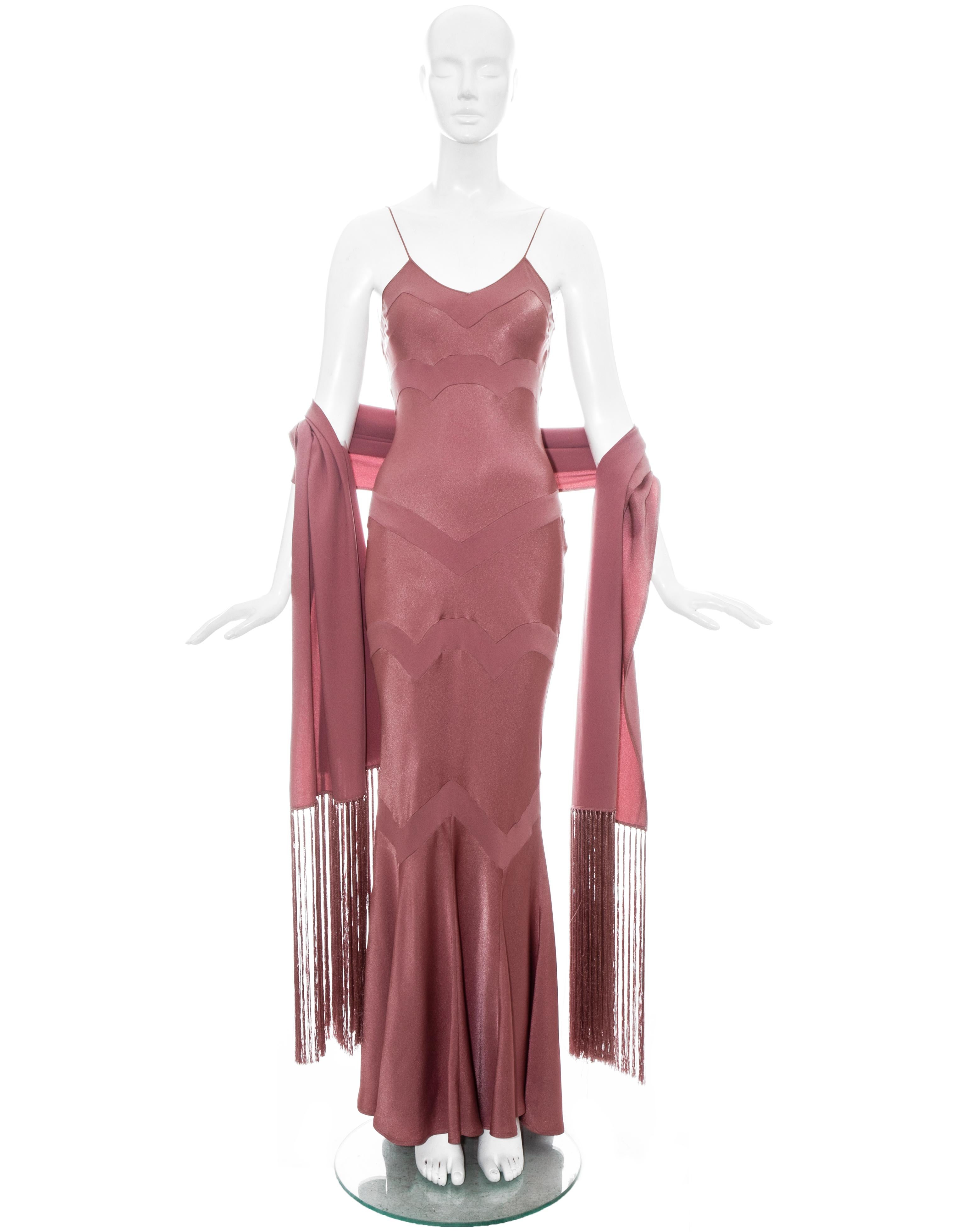 John Galliano pink satin evening dress with spaghetti straps and multiple bias-cut panels; sold with matching tasseled shawl.

Spring-Summer 2002