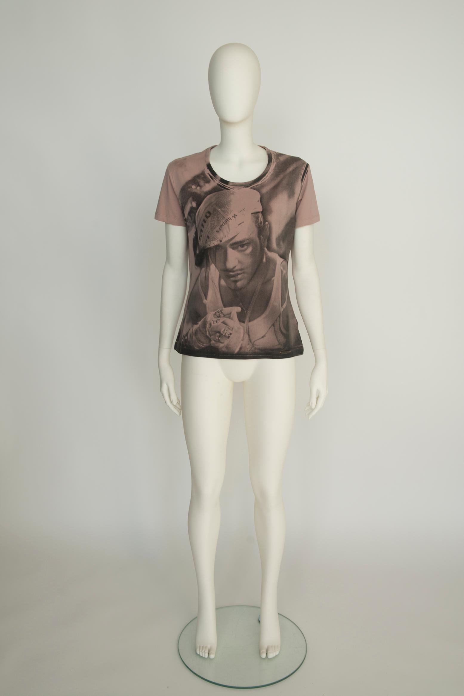Cut from soft stretch-jersey in a slightly slim shape with a classic crew neck, this vintage t-shirt is depicting John Galliano himself wearing a flat cap in his iconic 