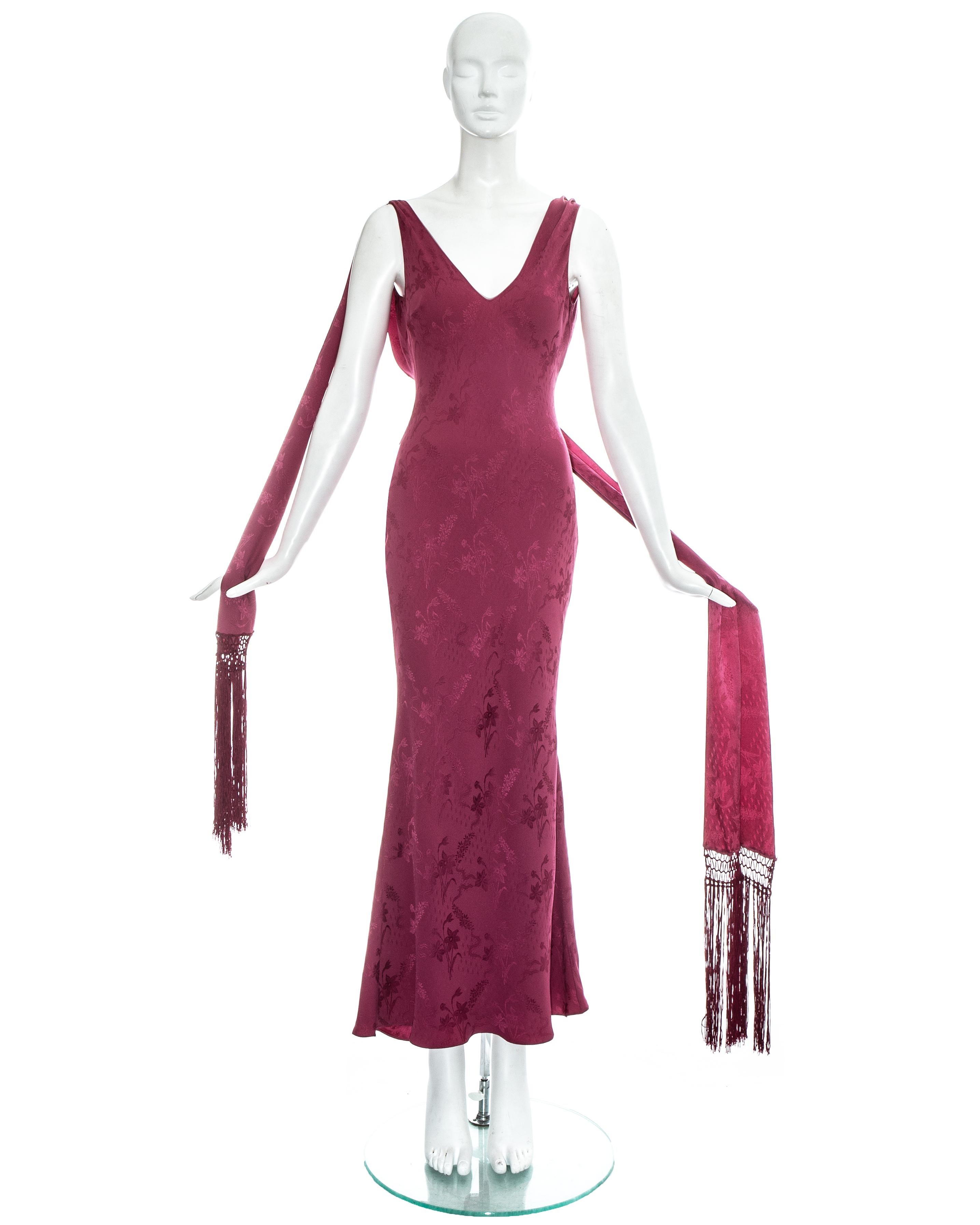 John Galliano rose pink silk brocade evening dress with attached fringed scarf and low back

Spring-Summer 1998