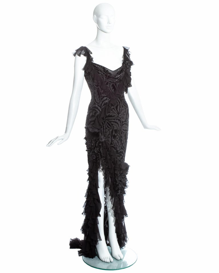 John Galliano metallic silk and black flamenco style silk evening dress. High leg slit, ruffled trim and train. 