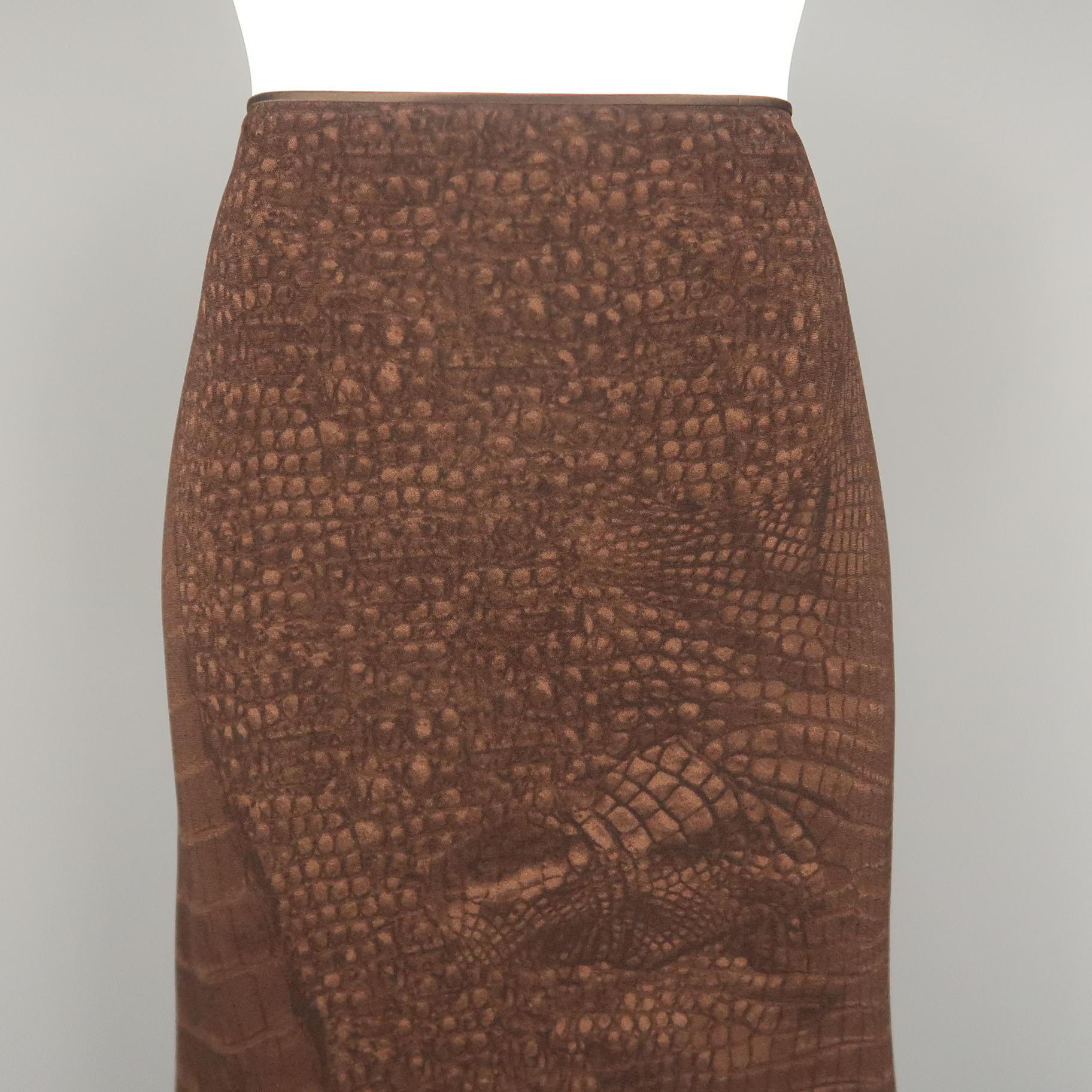 Archive JOHN GALLIANO A line maxi skirt comes in brown alligator print crepe with a satin waist piping trim, A line silhouette, and multi button side closure. Made in France.
 
Excellent Pre-Owned Condition.
Marked: 10
 
Measurements:
 
Waist: 30