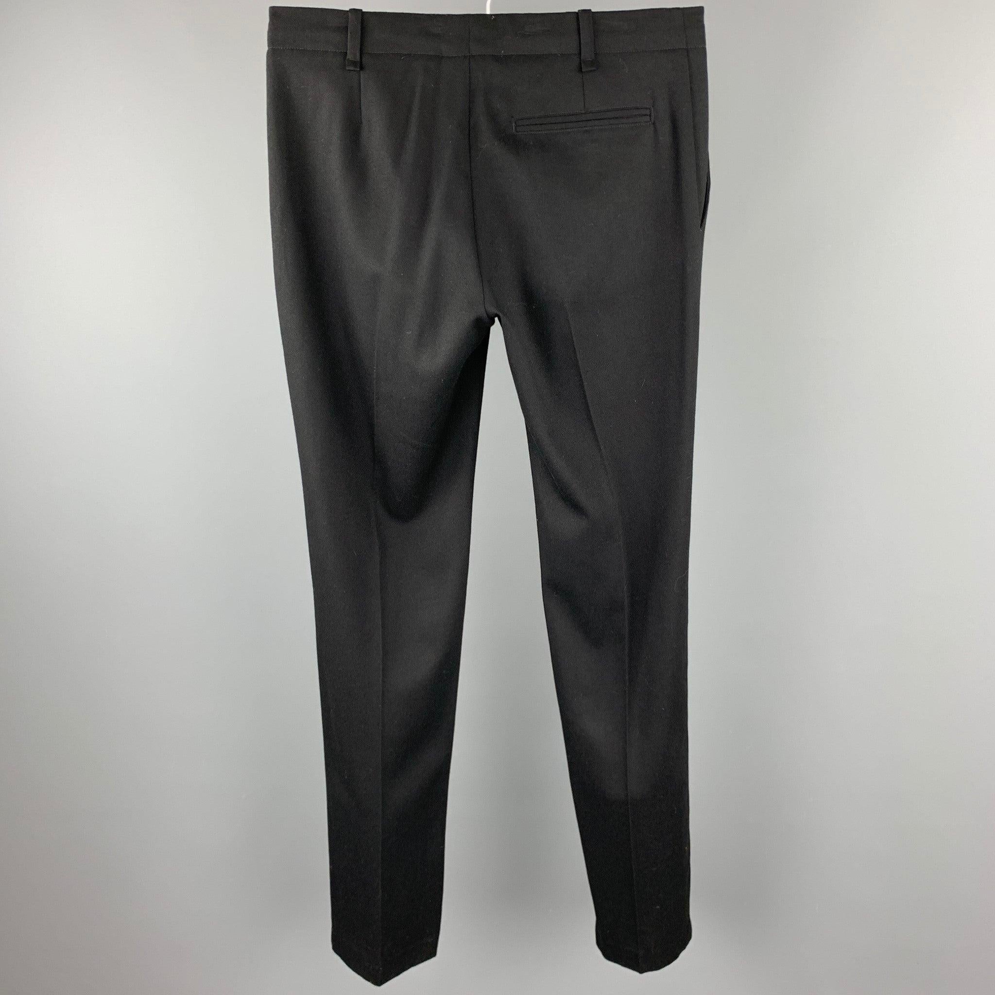 JOHN GALLIANO dress pants comes in a black wool featuring a flat front style and a zip fly closure. Made in Italy.Excellent
Pre-Owned Condition. 

Marked:   34/48 

Measurements: 
  Waist: 34 inches 
Rise: 8.5 inches 
Inseam: 35 inches 
  
  
