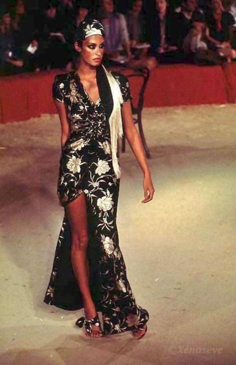 Modeled on the runway by Yasmeen Ghauri and worn by Ingrid Seynhaeve when attending Elite Model Look competition together with John Galliano in 1997.

The dress has beautiful wing sleeved that can be tied in bows and signature for Galliano draped