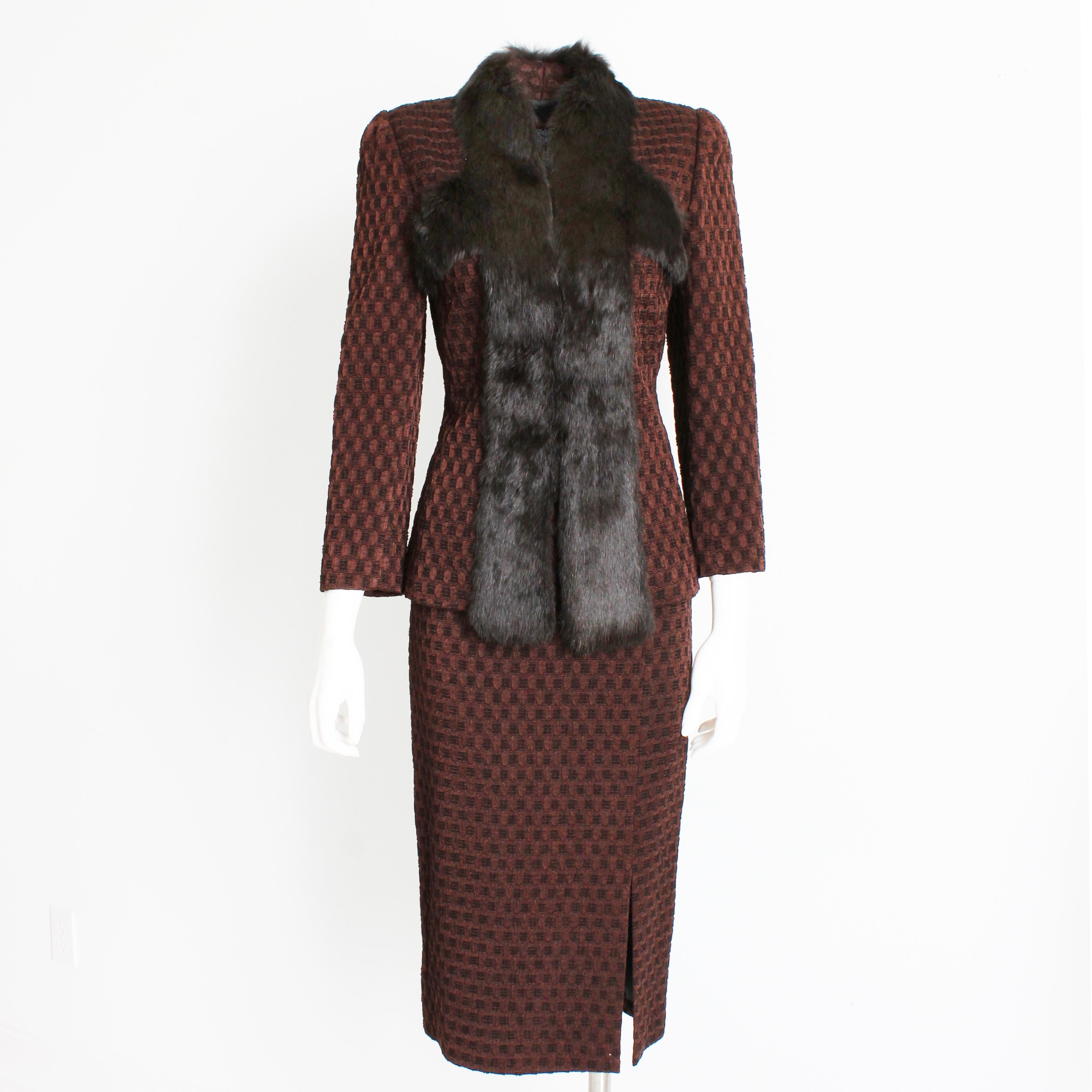 This incredible jacket and skirt ensemble was made by John Galliano, most likely in the late 90s or early 2000s. 

Made from a wonderful textured knit of brown silk and wool, the jacket is fitted and trimmed in supple Rex Rabbit fur.  The skirt