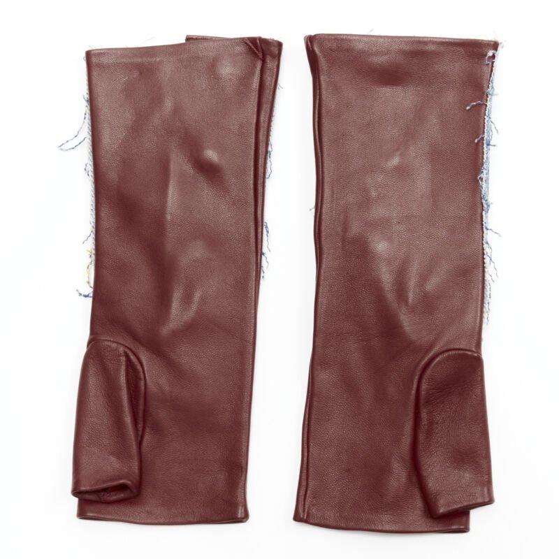 JOHN GALLIANO Vintage red calfskin leather denim fingerless floves
Reference: ANWU/A00897
Brand: John Galliano
Designer: John Galliano
Material: Calfskin Leather, Denim
Color: Burgundy
Pattern: Solid
Closure: Button
Extra Details: Antique gold tone