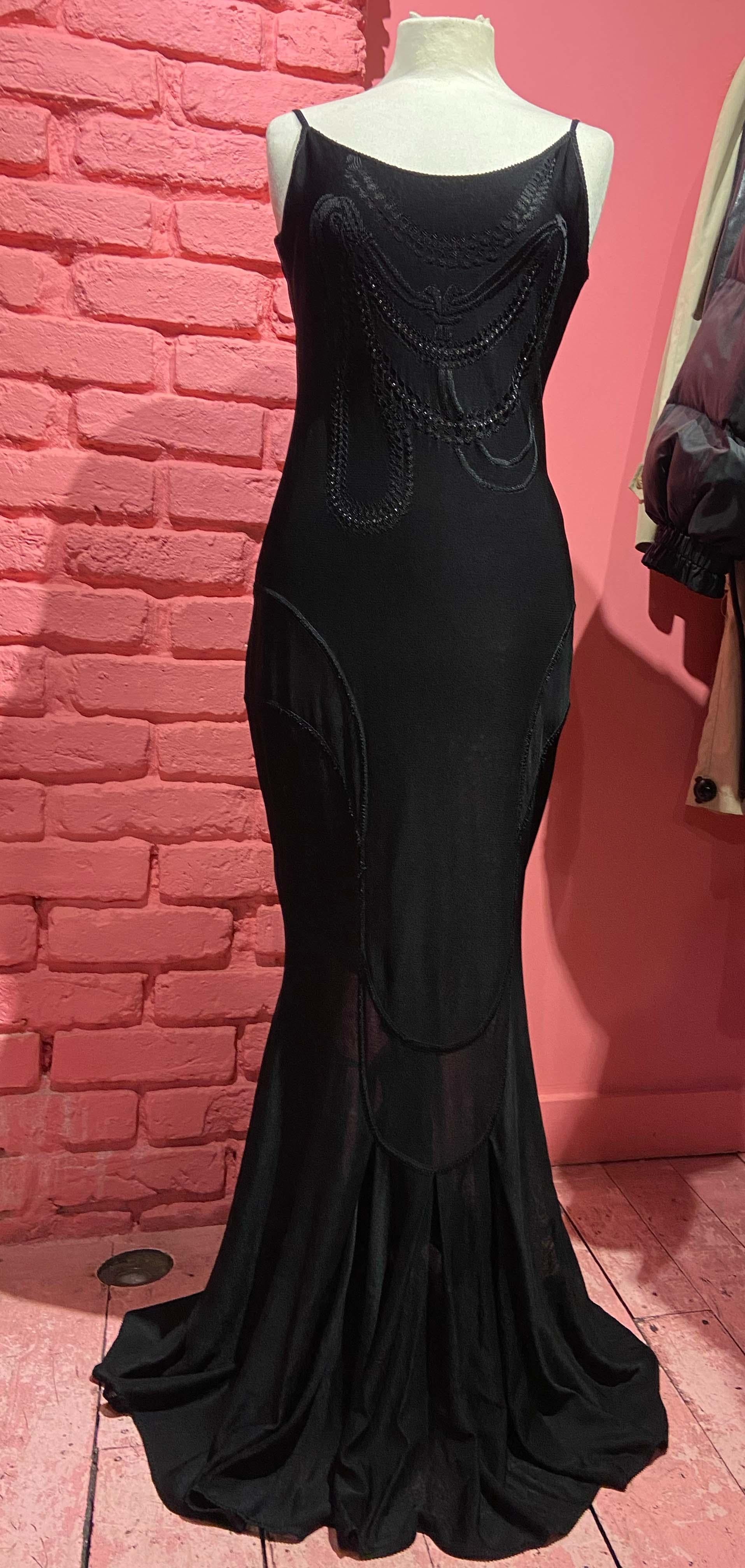 Vintage John Galliano from Spring Summer 2004 knit bodycon mermaid dress. Features a black crochet and diamond pattern at the front. 
In excellent condition. 

Brand: John Galliano
Color: Black
Size: UK10
Modern Size: UK: 8-10 US: 4-6 EU: