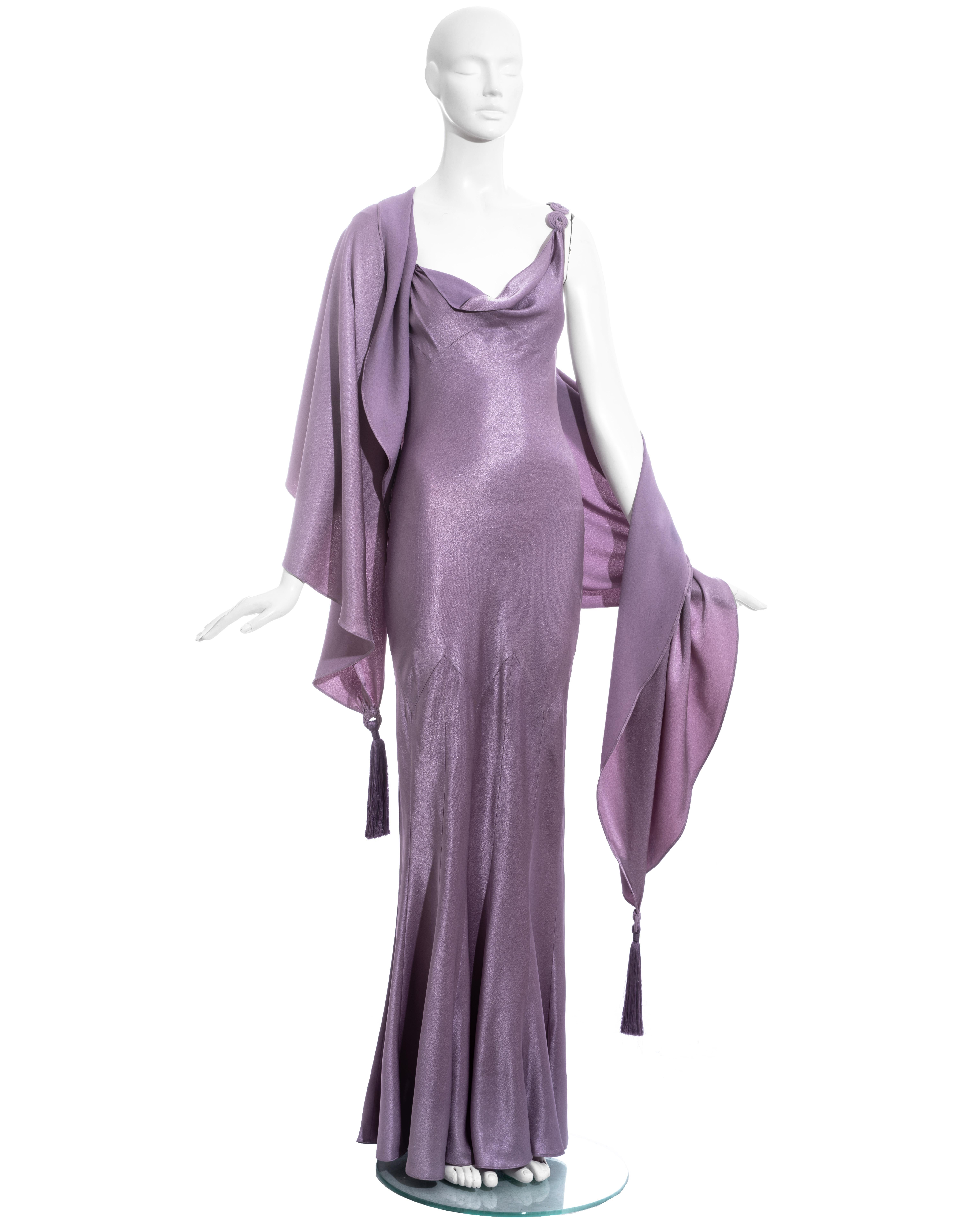 John Galliano violet crepe-backed satin evening dress with cowl neckline, multi-panelled skirt, and matching large shawl with tassels. 

Spring-Summer 2000
