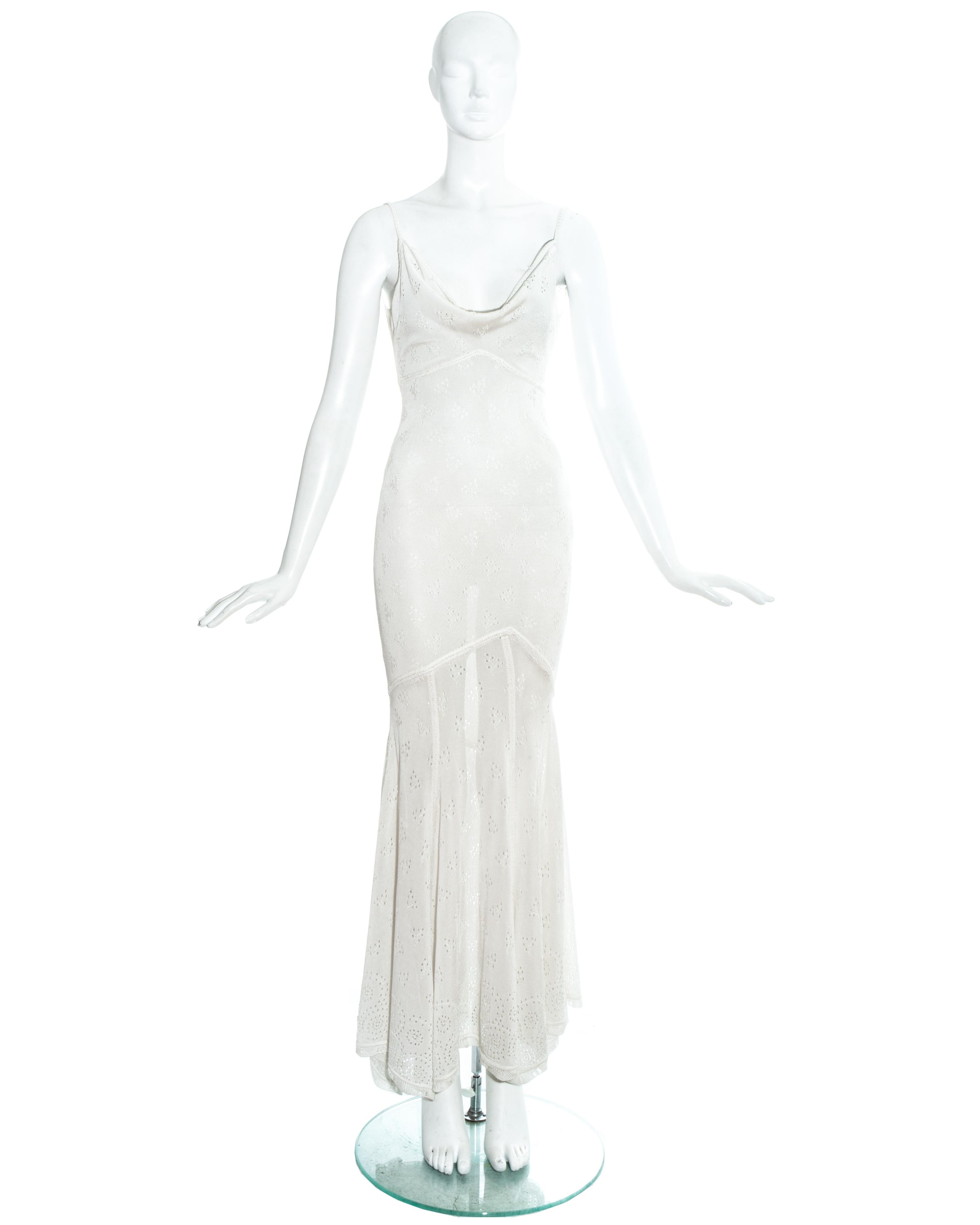 John Galliano crochet knitted maxi dress with low back and cowl neckline.

Spring-Summer 2000