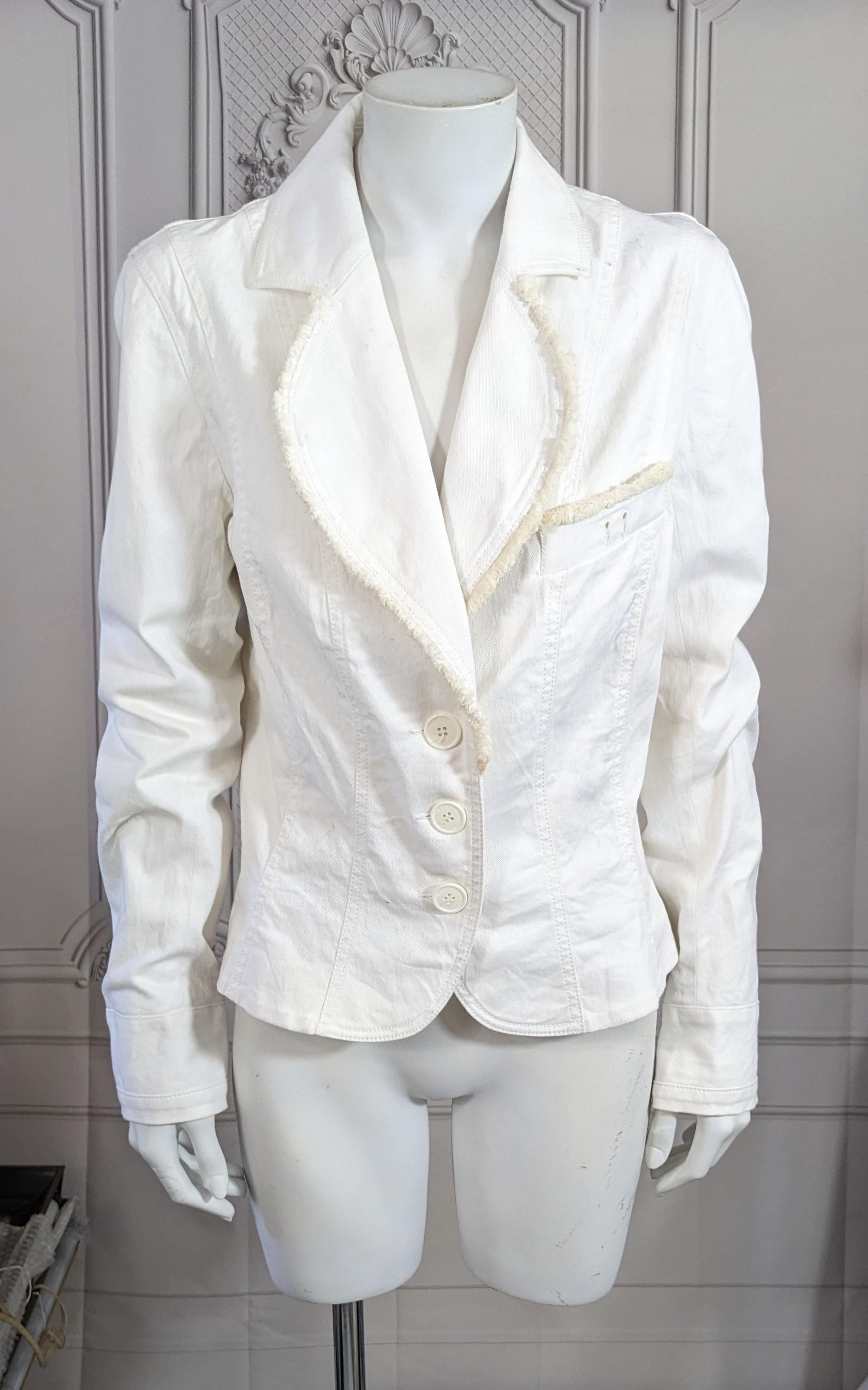 John Galliano white stretch denim blazer pre collection 2006. Fitted single breasted with self off white denim fringe. Size 8, stretch silk lining.
Good Condition, minor marks, Rubber Label.