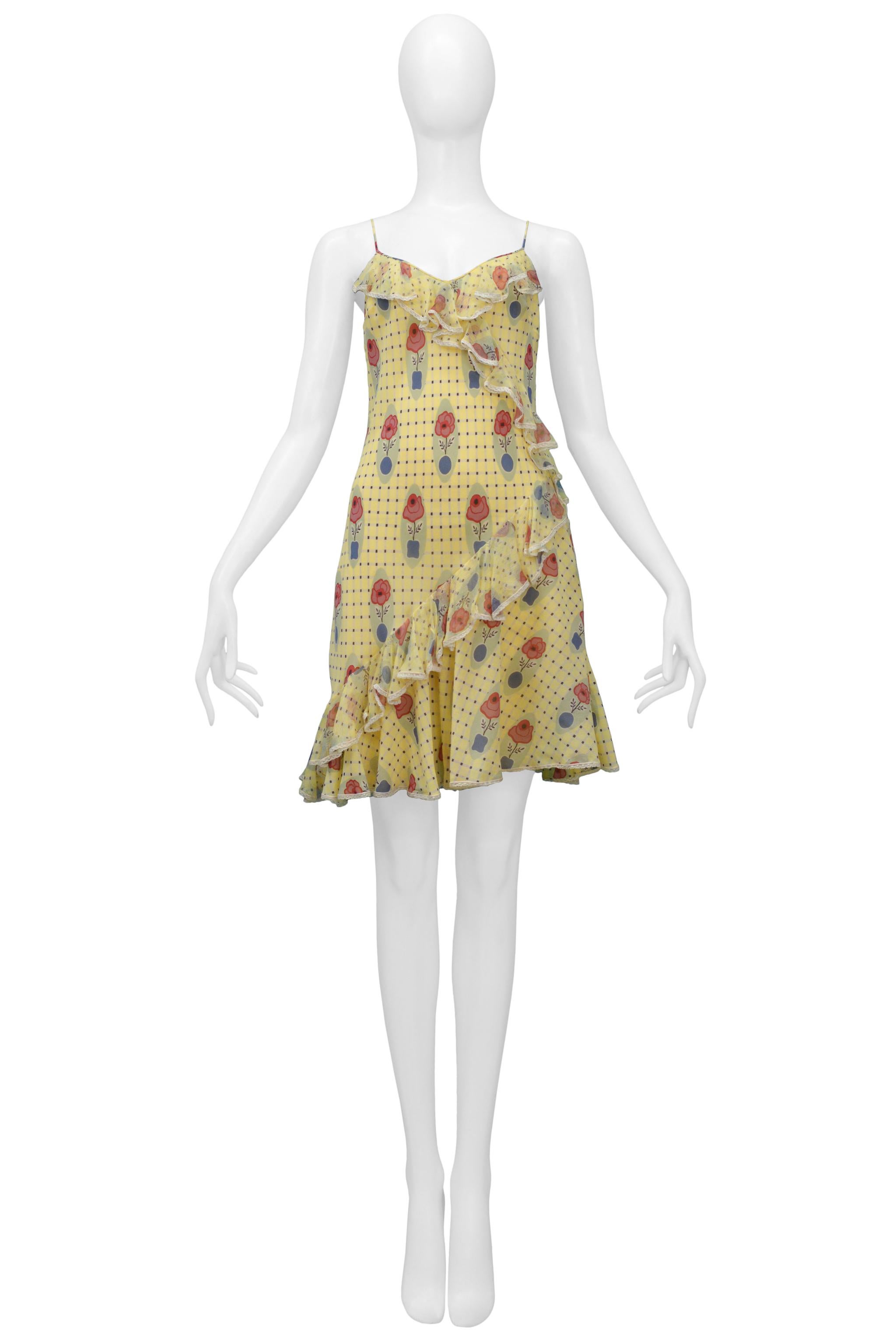 Resurrection Vintage is pleased to offer a vintage John Galliano yellow slip dress featuring a check print with potted flowers, ruffles along the front and back of the dress, and white lace trim

John Galliano 
Size 42
100% Silk 
Excellent Vintage