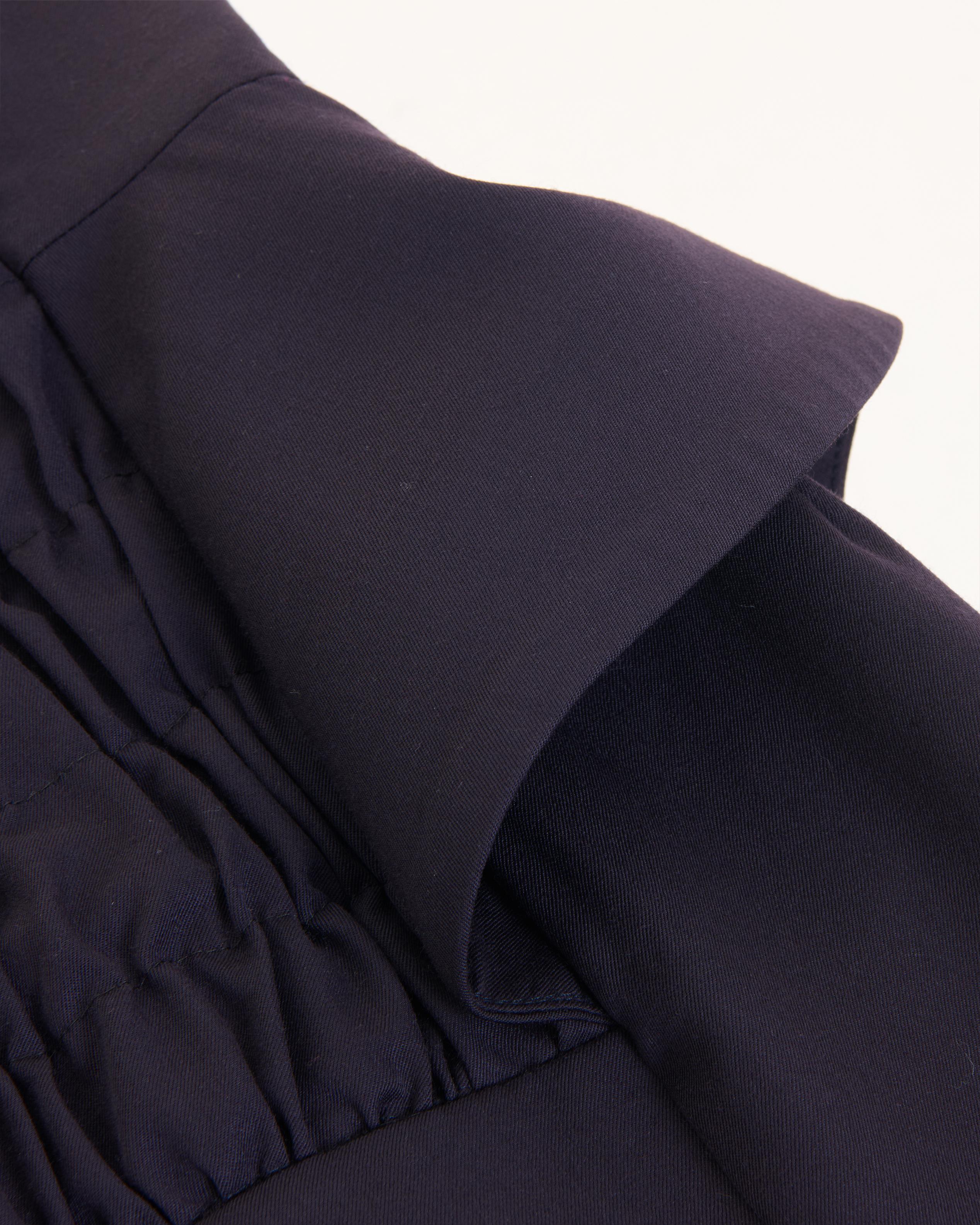 John Galliano	F/W 1986 ‘Fallen Angels’ collection plum wool overlapped skirt 2