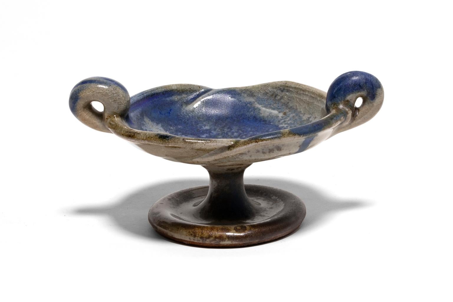 SALE ONE WEEK ONLY

John Glick is well-known for his beautifully rendered functional pieces of art. His decorative pieces, especially his large pots, are breathtakingly powerful objects. Glick's creative genius, however, is most exquisitely shown in