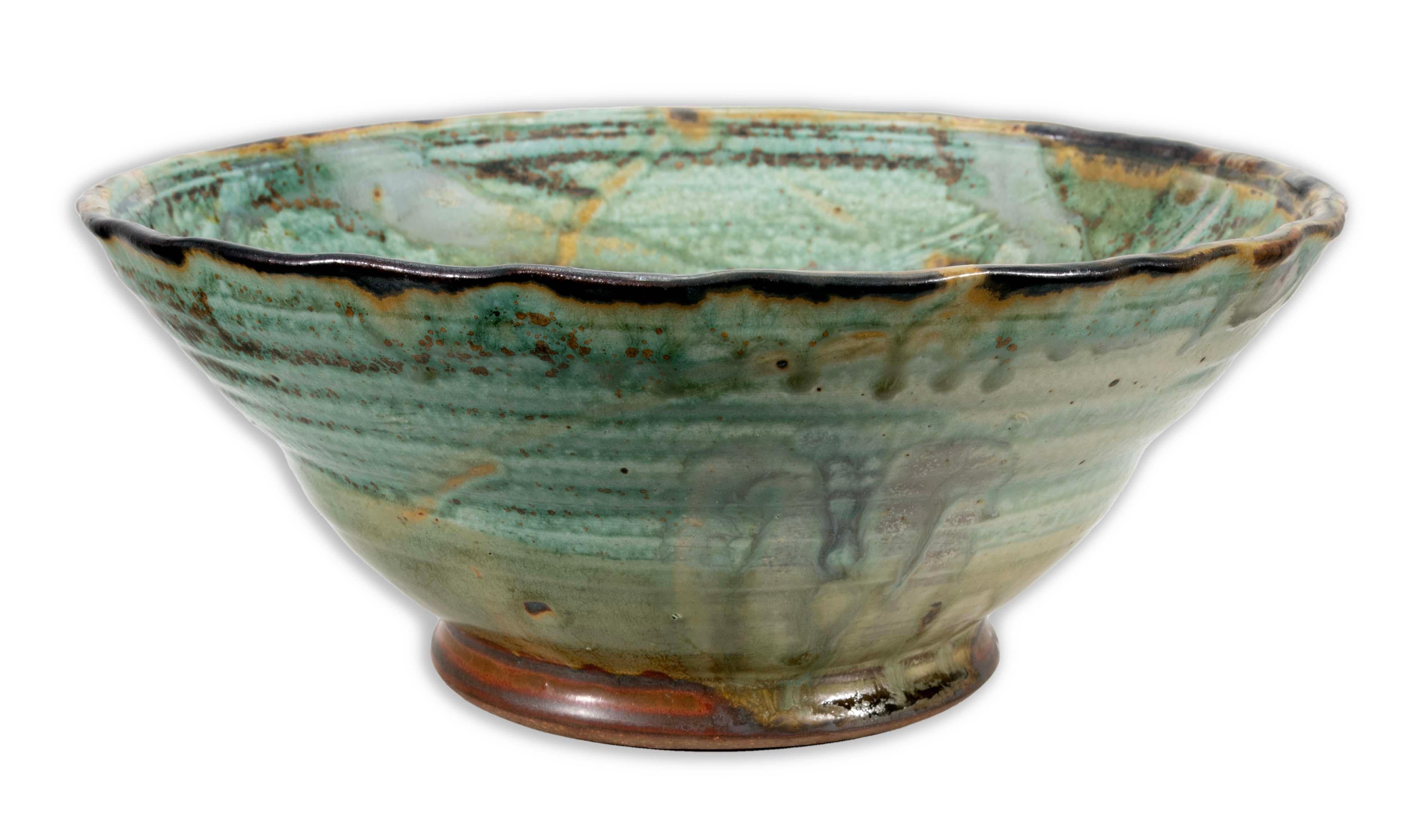 Cuenco modernista de cerámica esmaltada de gres, obra del artista de Detroit John Glick, de Plum Tree Pottery. Hacia finales del siglo XX. Esmaltado en tonos tierra. Artístico y funcional a la vez, es una declaración moderna y única. De una