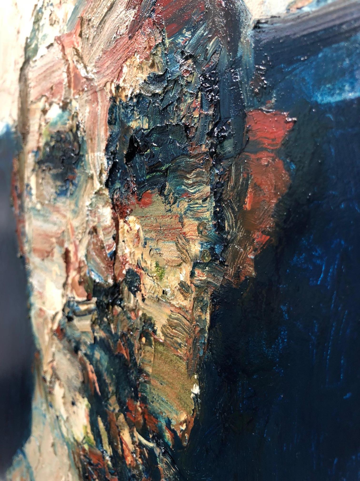 Bold in cobalt, ultramarine blue and earth colors, abstracted male head portrait painted on pale wood panel by John Goodman, whose paintings, drawings, and sculptures are a dichotomy of understated minimalism with reductive use of color that conveys