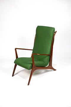 John Graz. John Graz armchair, c. 1960 Caviuna wood and linen tapestry