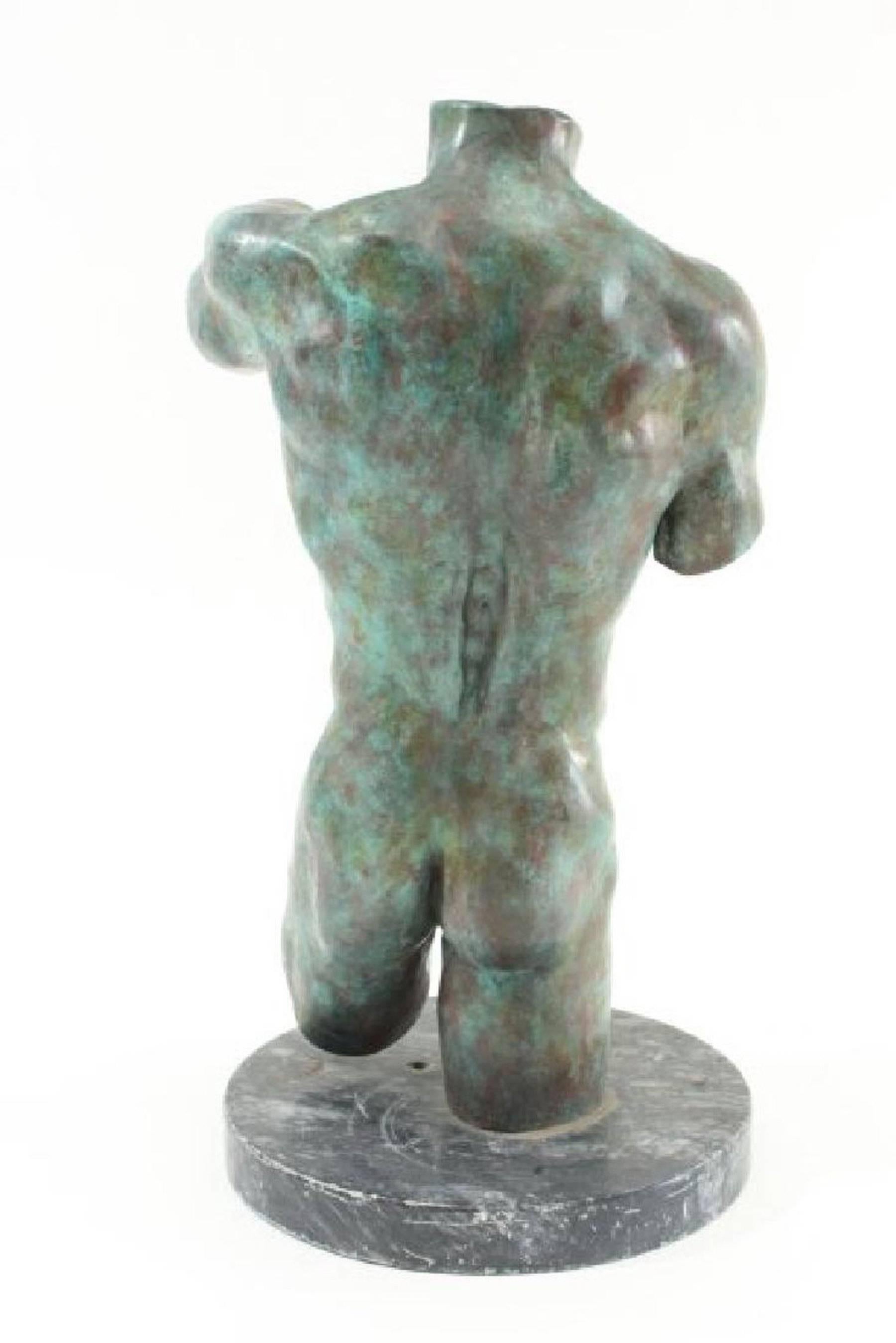 John H. Jones, male nude study, in verdigris bronze on a marble solace, copyrighted and signed.