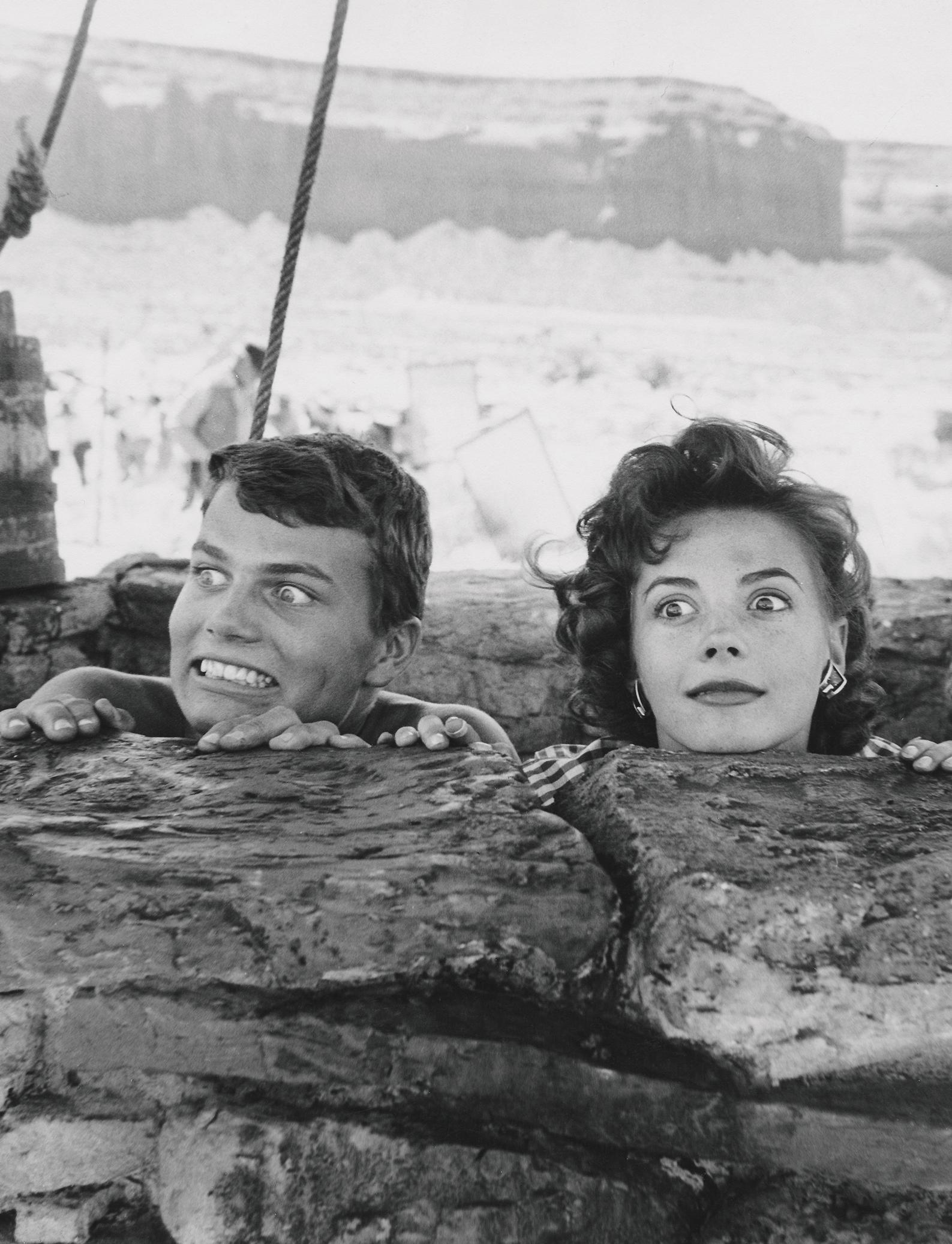 John Hamilton Black and White Photograph - Natalie Wood and Patrick Wayne Goofing Around on Set