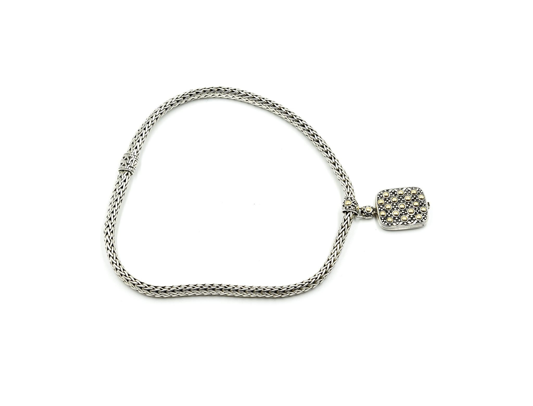 Designer: John Hardy
Collection: Dot Collection
Material: sterling silver and 18k yellow gold
Dimensions: necklace measures 16-inches long and 1/4-inch wide, pendant measures 1 3/4-inches long and 7/8-inch wide
Weight: 110.15 grams
Retail: $1,495 

