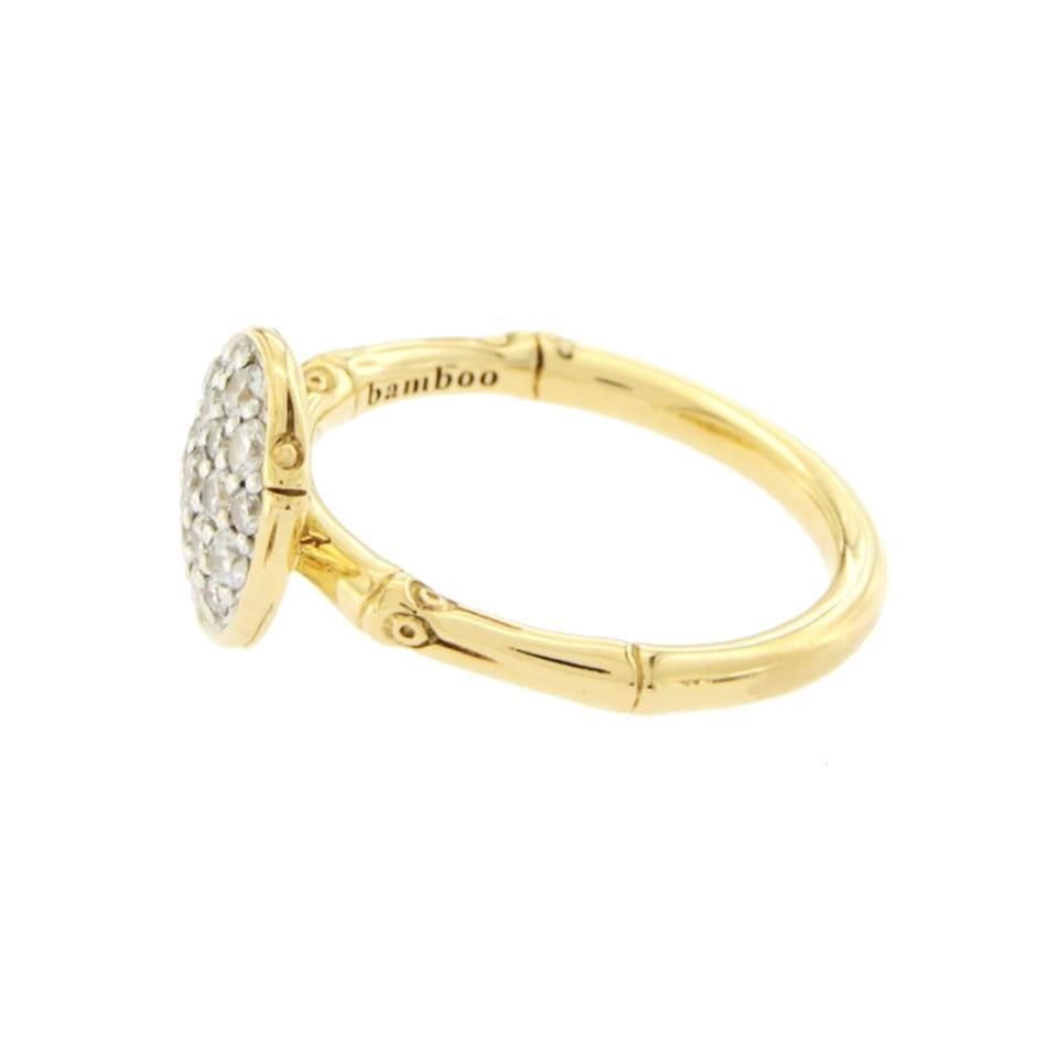 Type: Ring
Top: 10.5 mm
Band Width: 2 mm
Metal: Yellow Gold
Metal Purity: 18K
Size:7
Hallmarks: JH 18K Bamboo
Total Weight: 5.4 Grams
Stone Type: Diamonds 0.55 CT
Condition: Pre-Owned
Stock Number: U16
