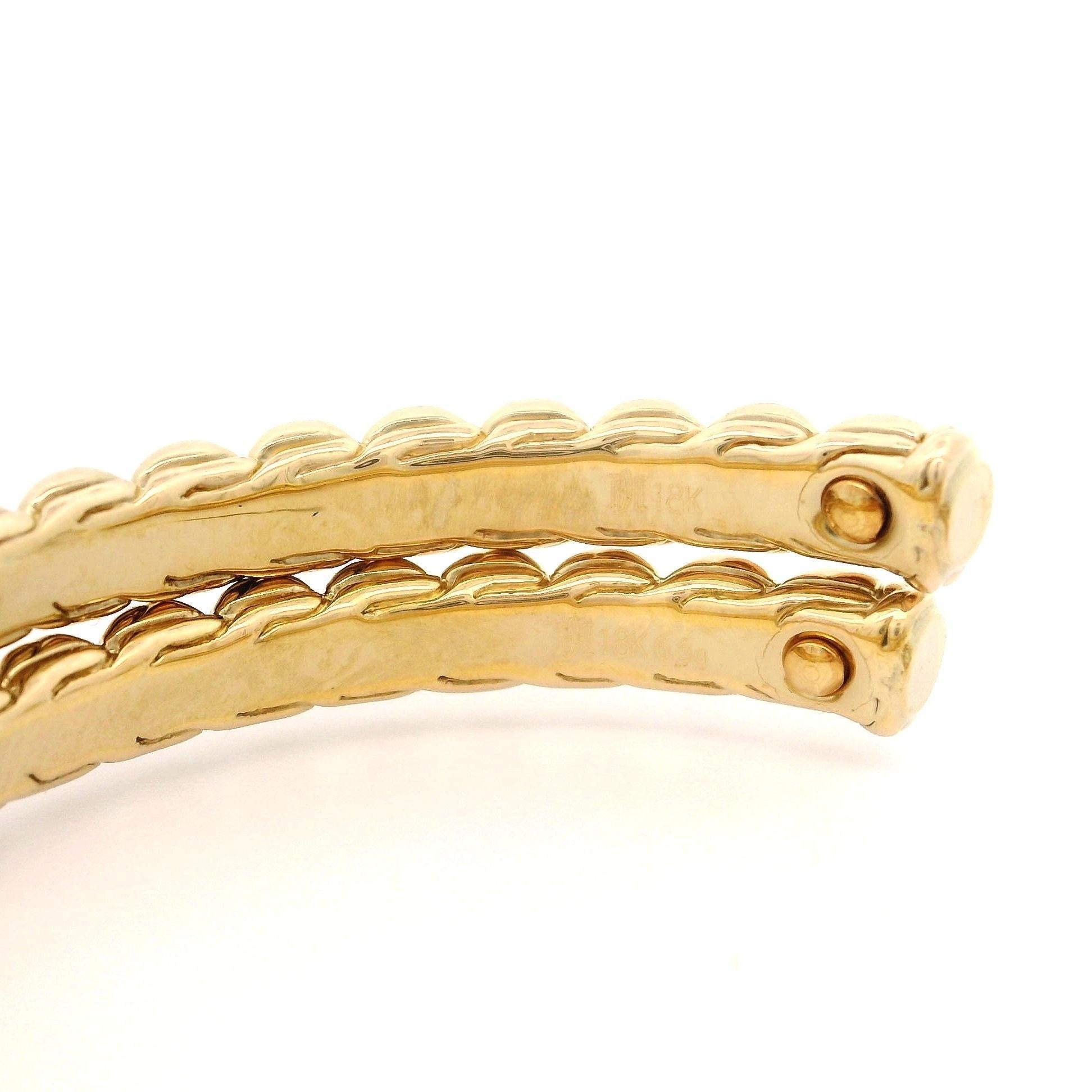 --Stone(s):--
(60) Natural Genuine Diamonds - Round Brilliant Cut - Pave Set - Nice White Color - 0.25ctw (approx.)

Material: Solid 18k Yellow Gold w/ White Gold Accents
Weight: 8.41 Grams
Overall Width: 37.7mm (1.1