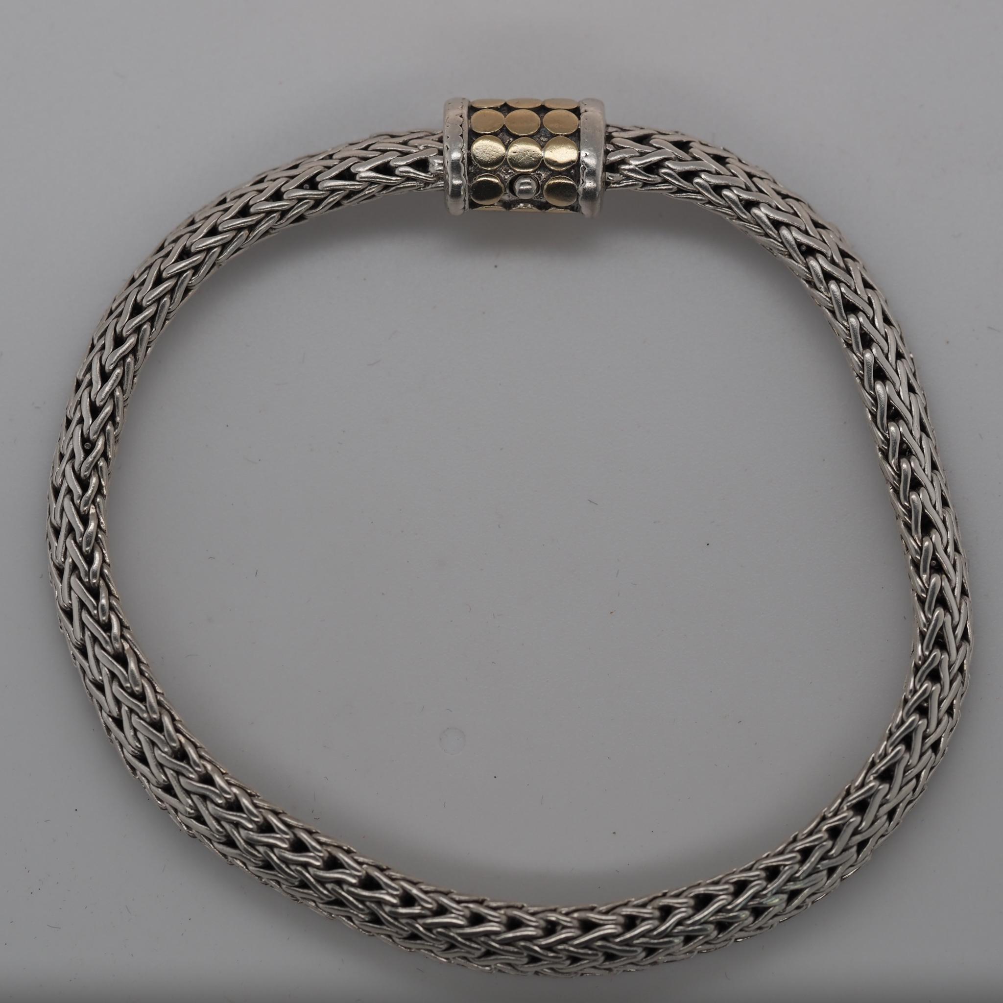 Designer: John Hardy
Item Details:
Metal Type: 18K Yellow Gold and Sterling Silver [Hallmarked, and Tested]
Weight: 24.8 grams (All Items Total)
‌
Bracelet Length Measurement: 8 Inches
Condition: Excellent
