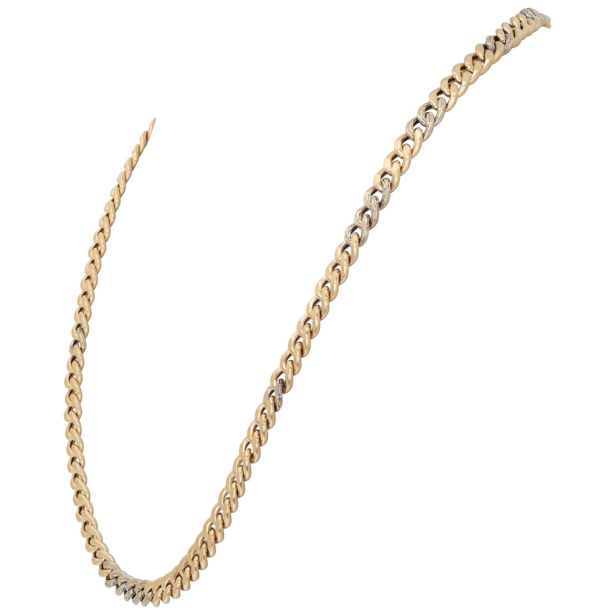 John Hardy cuban-link style chain necklace in 18k yellow gold with bark-finished links stations. Measures 26 inches, width 7mm.