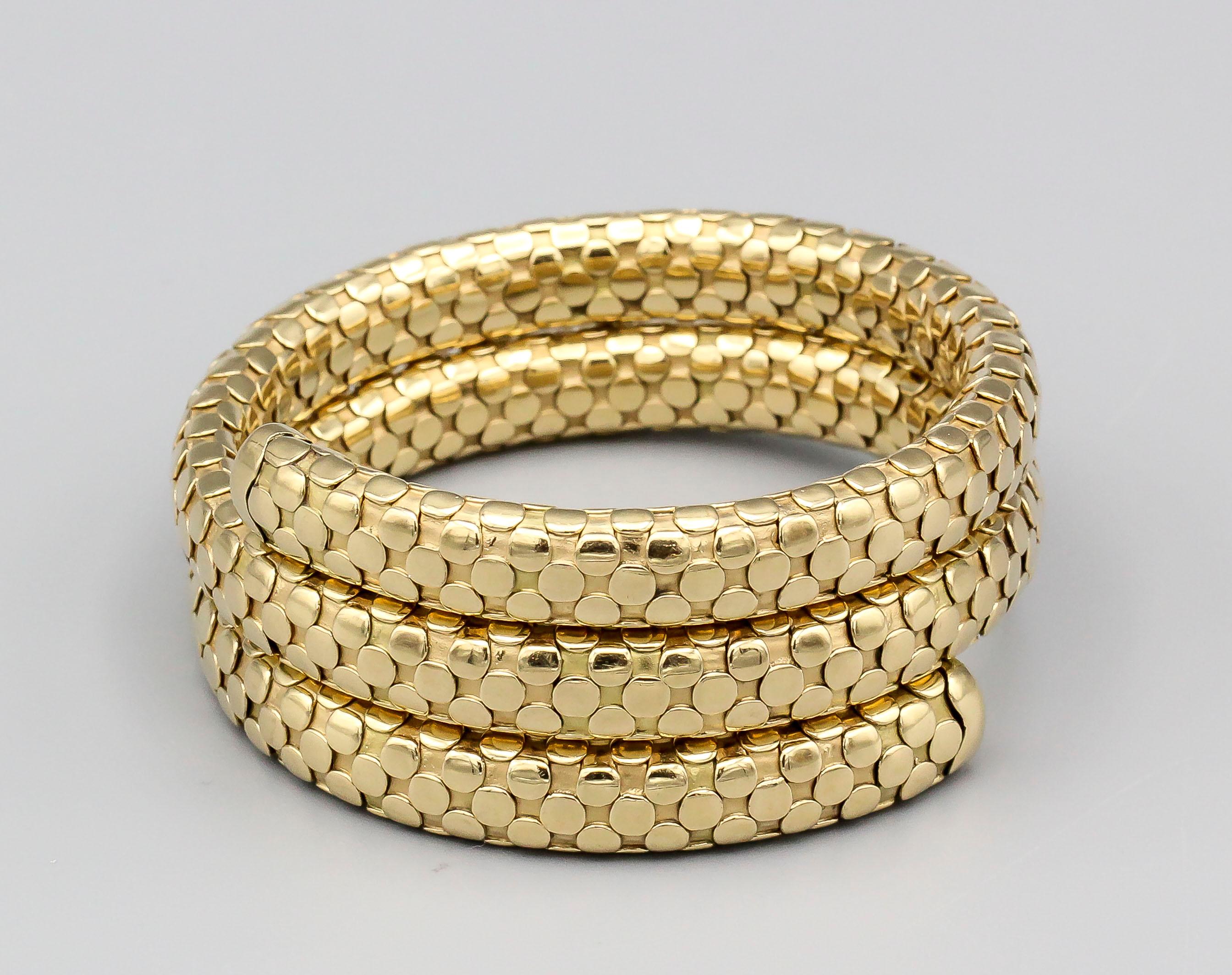 Feines Spiralarmband aus 18 Karat Gelbgold aus der Kollektion 