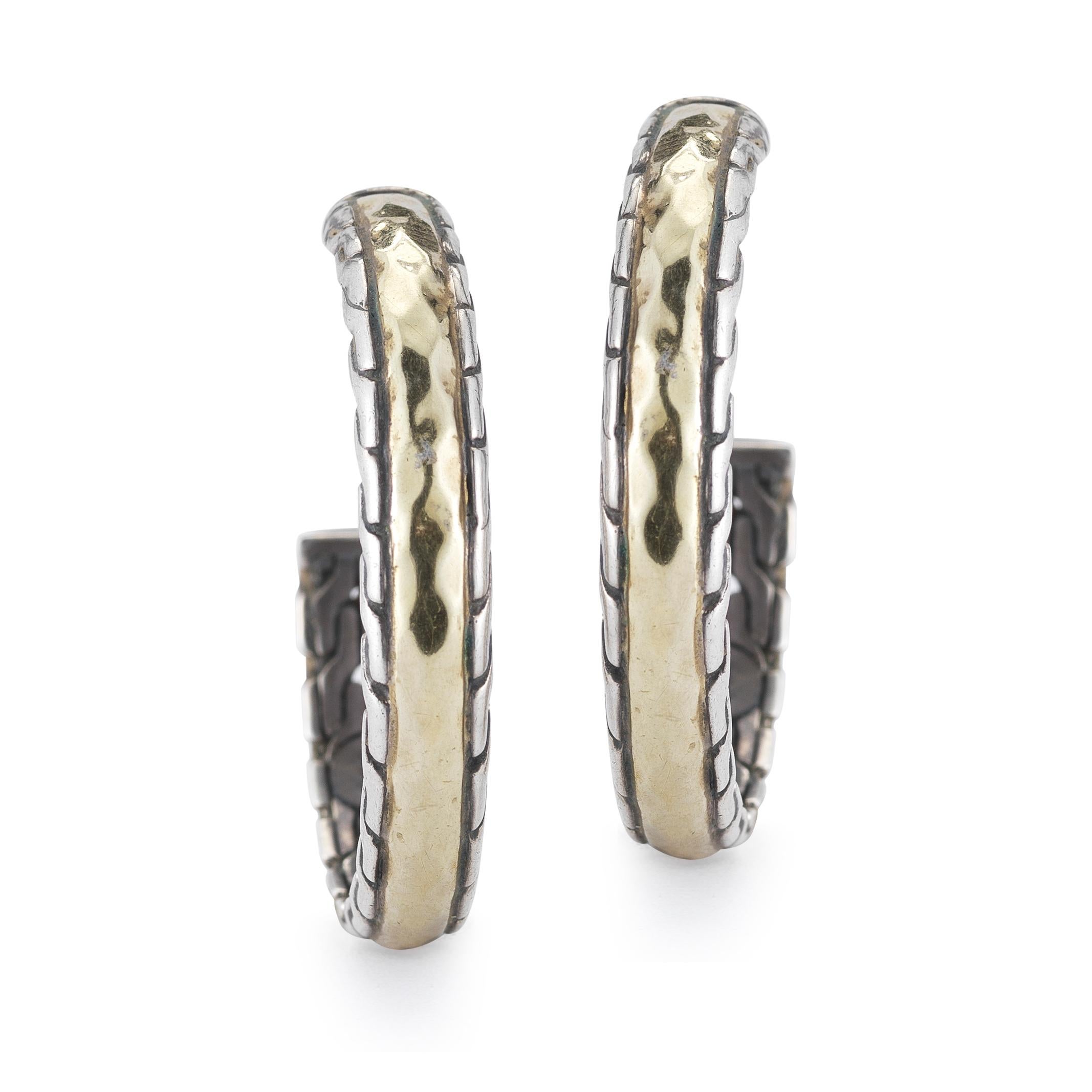 These 22 karat yellow gold and sterling silver medium size hoops from the John Hardy Palu collection are hand hammered with a chain patterned edge. The diameter of the hoops is 1.25 inches.
