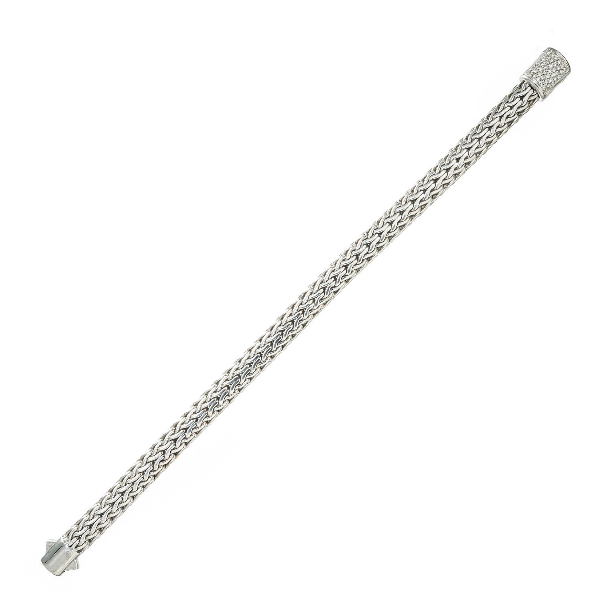John Hardy round wheat sterling silver bracelet with a diamond pave clasp. 7.5 inches in length. 

42 round brilliant cut diamonds, G SI approx. .24cts
Sterling Silver 
18k White Gold 
Stamped: M
Hallmark: In 18k JH
40.4 grams
Bracelet: 7.5