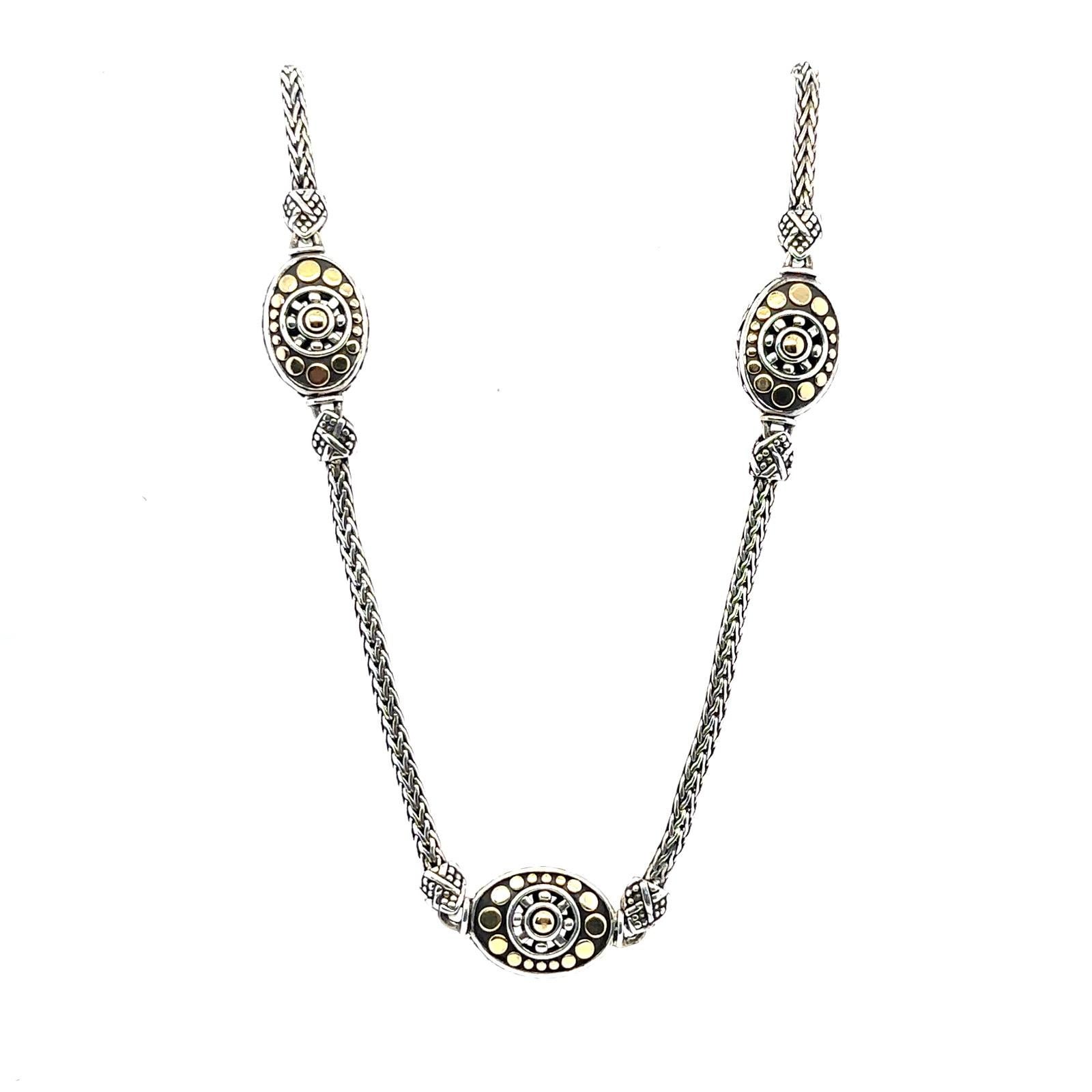 From designer John Harvey a 925 Sterling Silver necklace with silver and 18k yellow gold ovals. Chain is 16