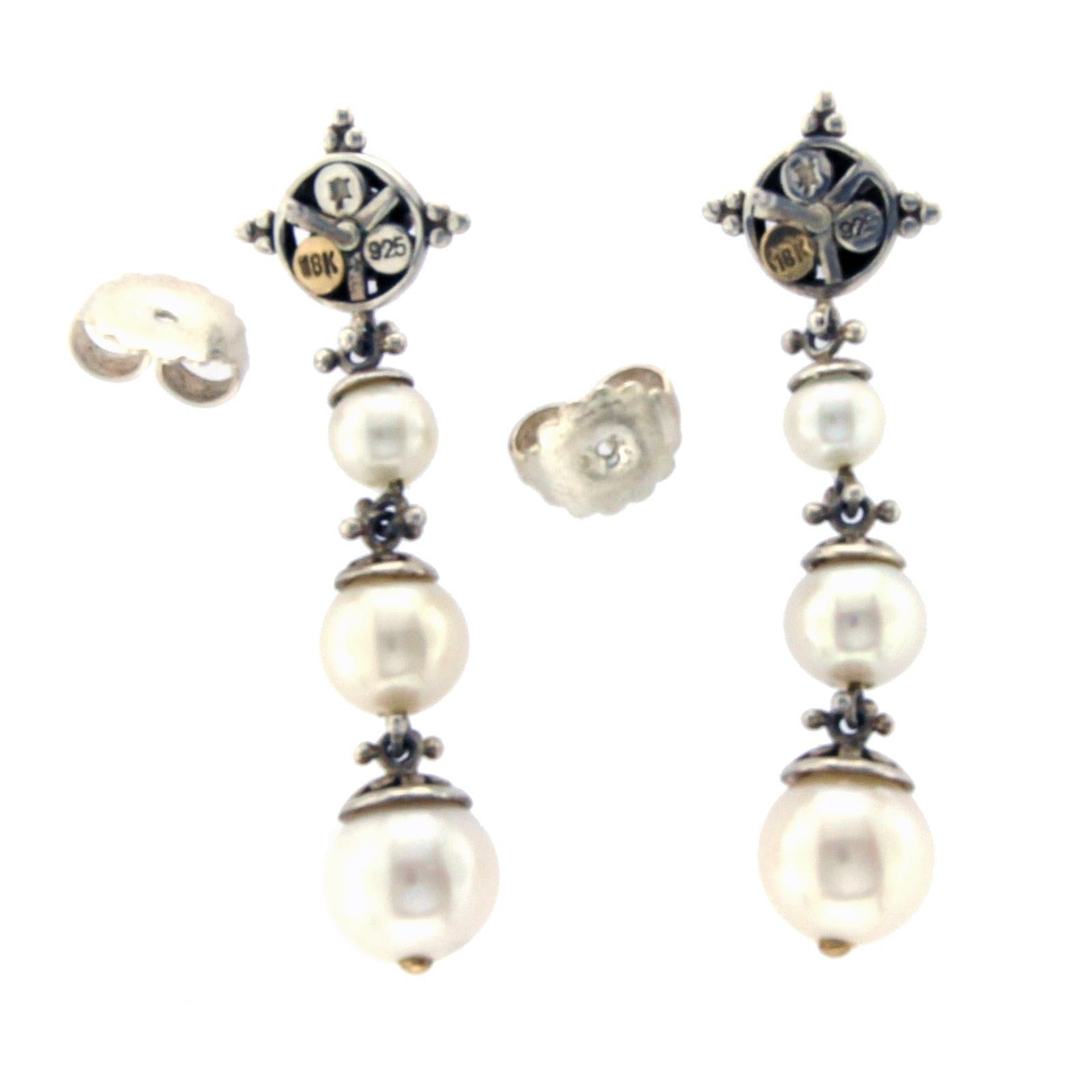 Type: Earrings
Height: 48 mm (1.90 Inches)
Width: 10 mm
Metal: Silver and Gold
Metal Purity: 925 18K
Hallmarks: JH 925 & 18K
Total Weight: 10.2 Grams
Stone Type: Pearl
Condition: Pre Owned
Stock Number: U214
