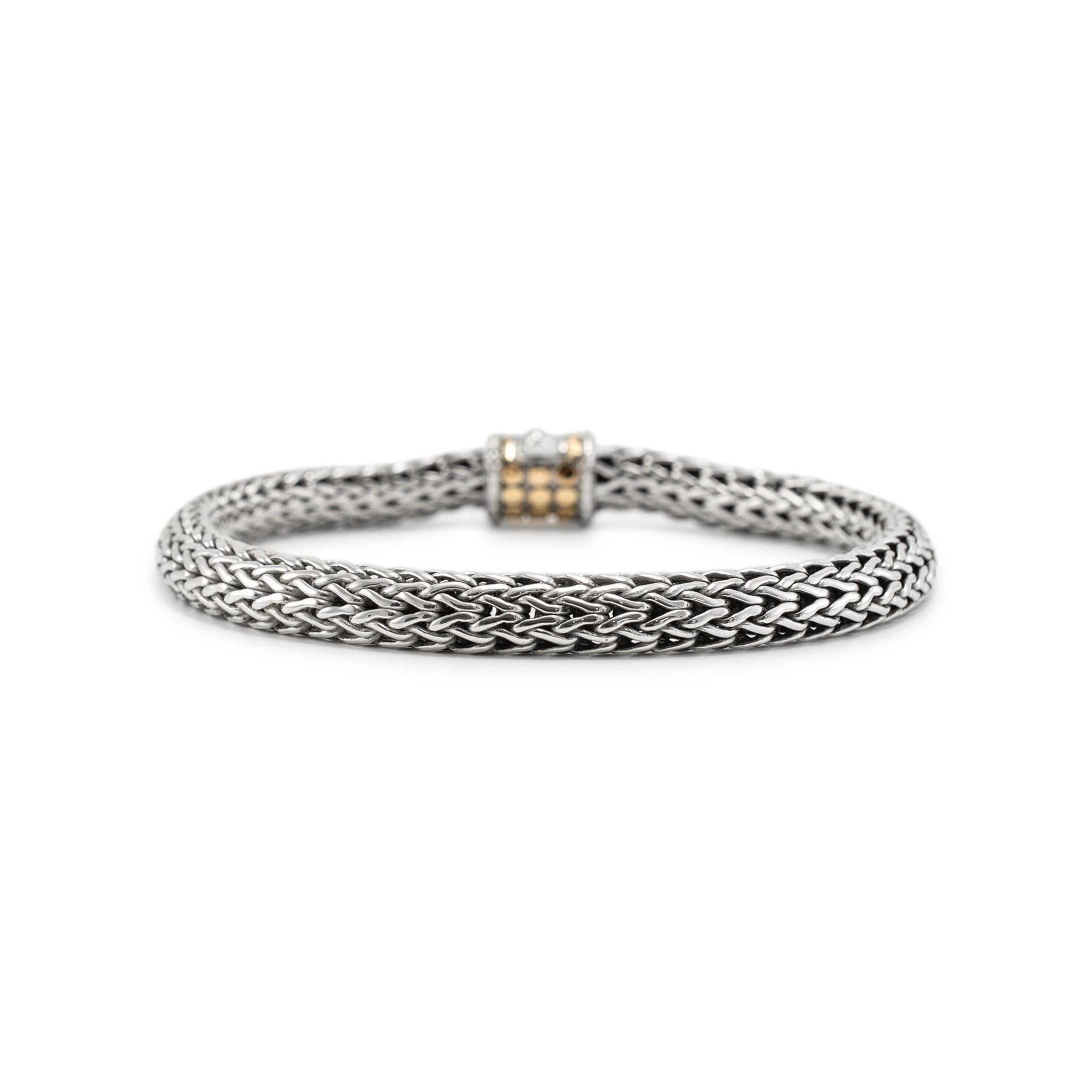 Brand: John Hardy

Gender: Unisex

Metal Type: 925 Sterling Silver & 18K Yellow Gold

Length: 6.75 inches 

Width: 6.50 mm

Weight: 25.95 Grams

Designer made textured  silver and 18K yellow gold, link bracelet. The metals were tested and determined