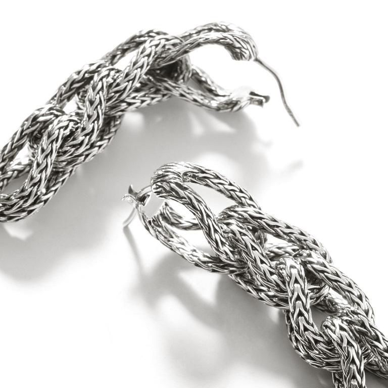 John Hardy's drop earrings feature the brand's signature soft links made of interfolded hand-shaped strands of classic chain. Each link is made of sterling silver.

Metal: 925-Sterling Silver
Drop Length: 49.5 MM
Closure: Snap Lock
Design Details: