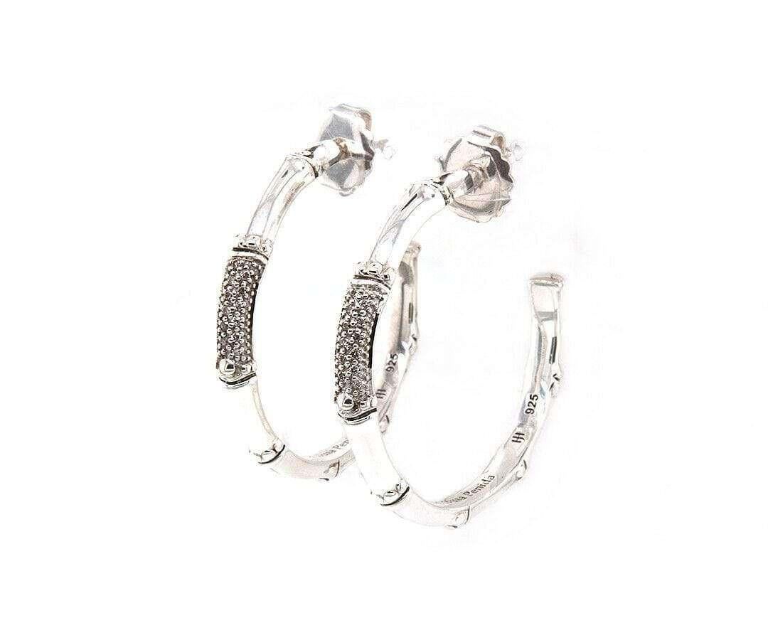 John Hardy Bamboo Diamond Pave Hoops in Sterling Silver

John Hardy
Bamboo Diamond Pave Hoops
Sterling Silver
Diamond
Earring Size : Approx. 40 Mm
Weight: Approx. 12.80 Grams
Stamped, JH, This Earring Planted 26 Bamboos On Nusa Penida,